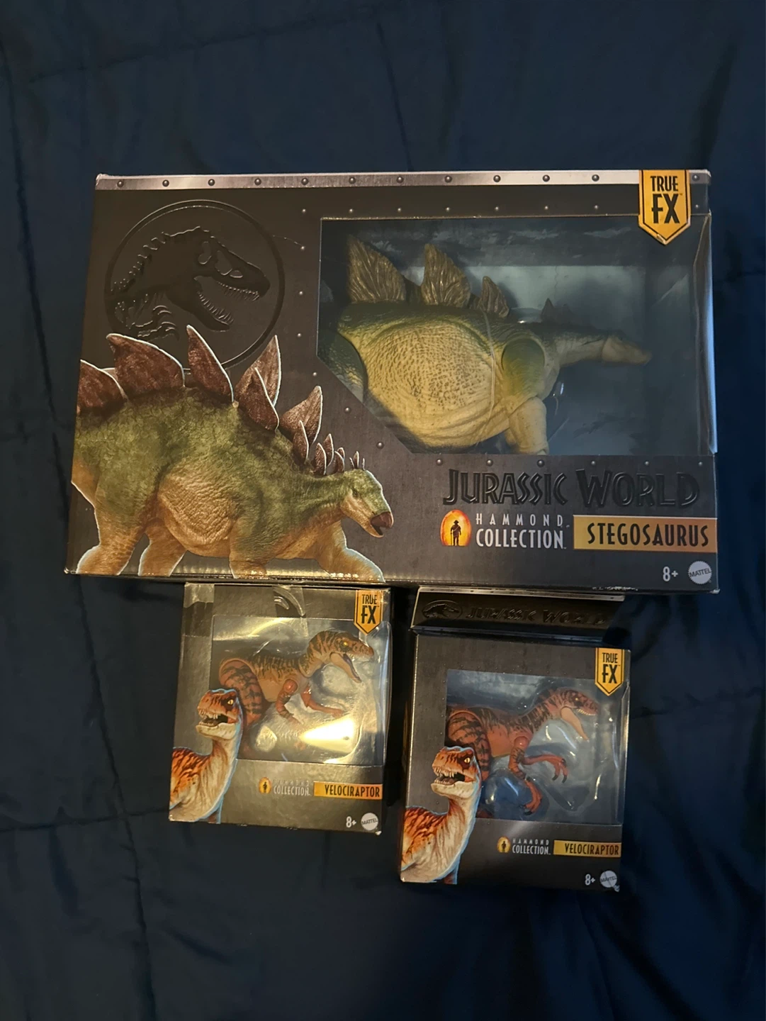 Jurassic World Hammond Collection Stegosaurus & 2 Velociraptors