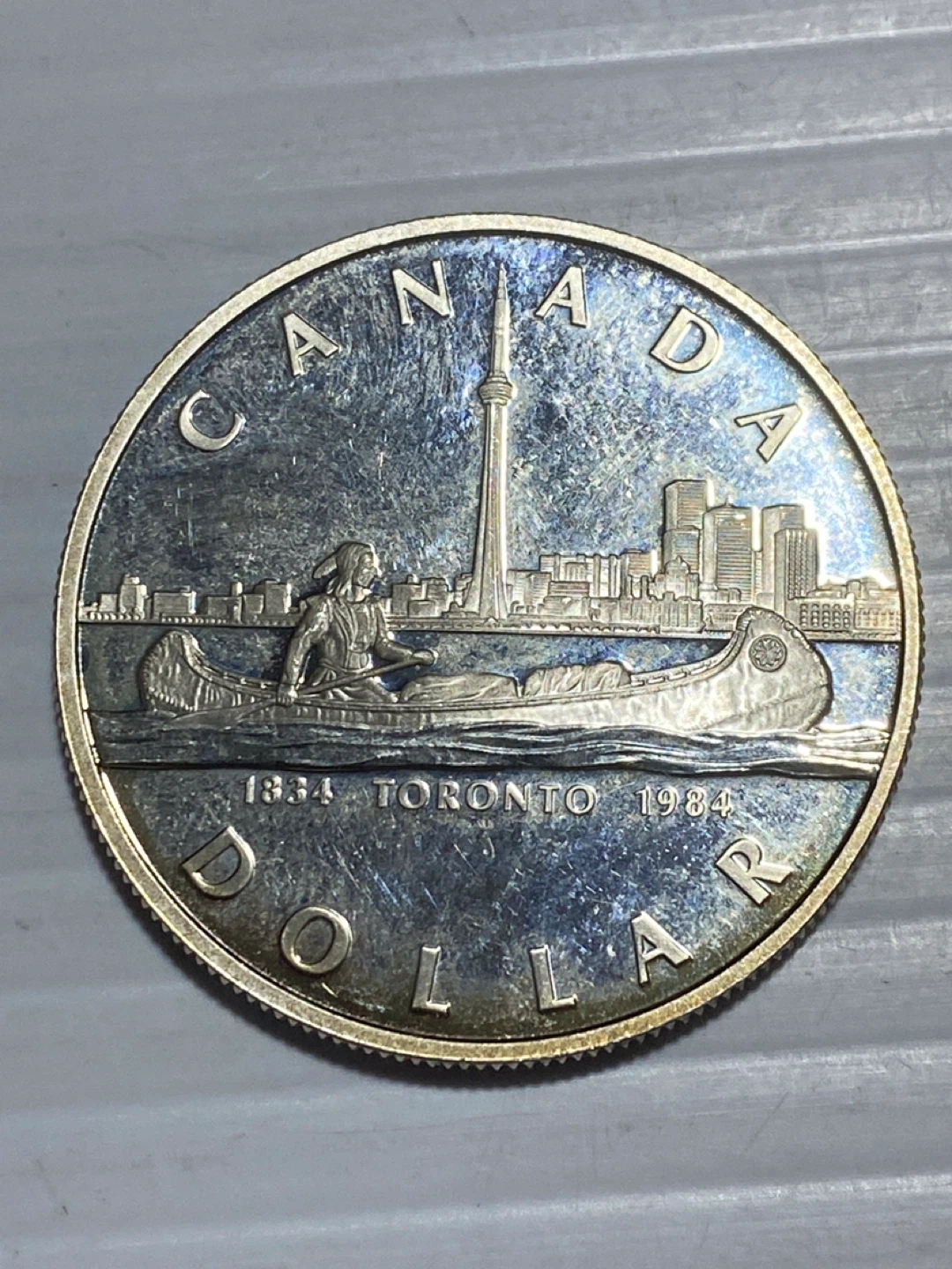 1984 silver Canadian Dollar Coin - Toronto 1984