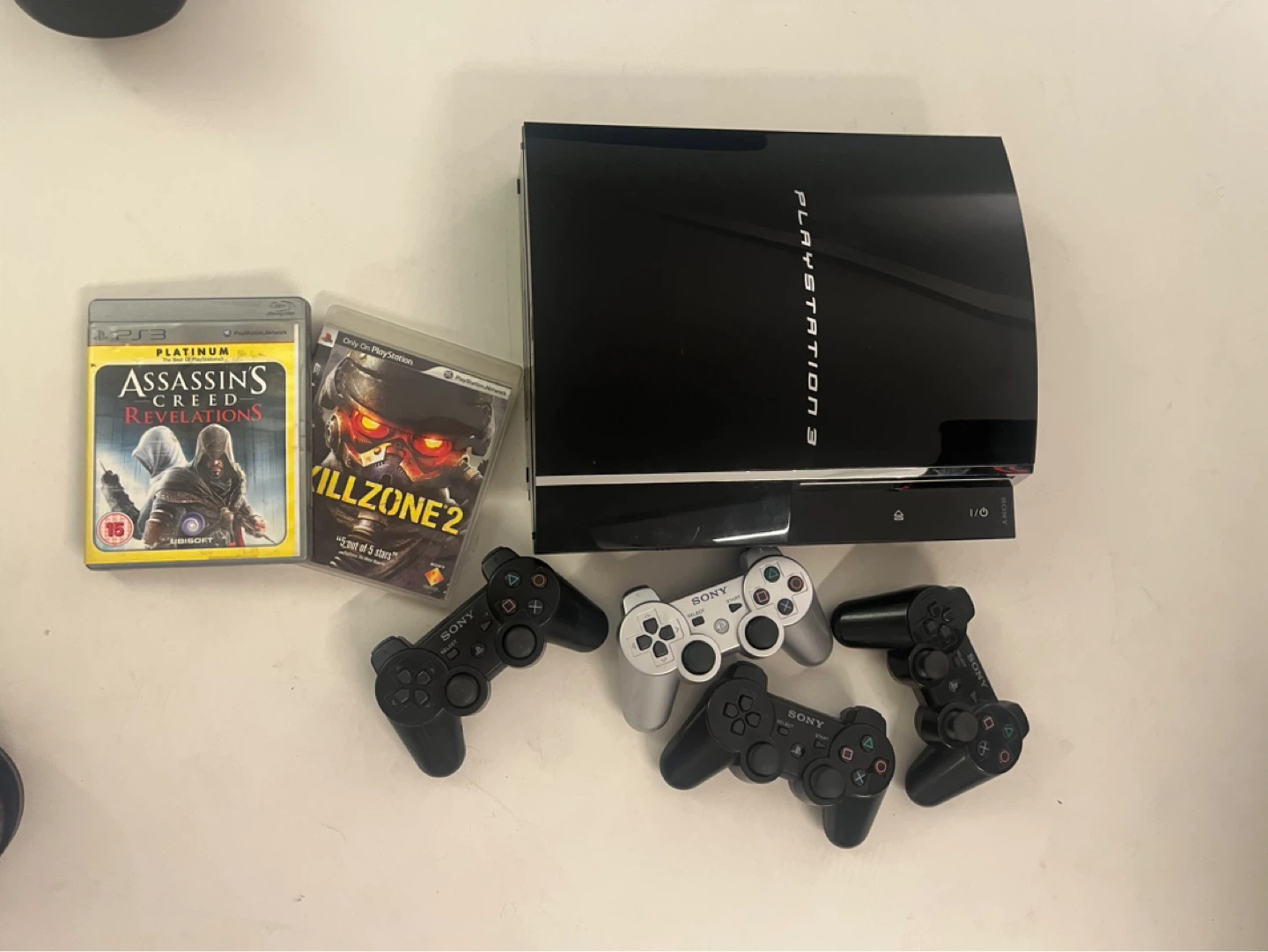Sony PlayStation 3 Console Bundle with Games and Controllers