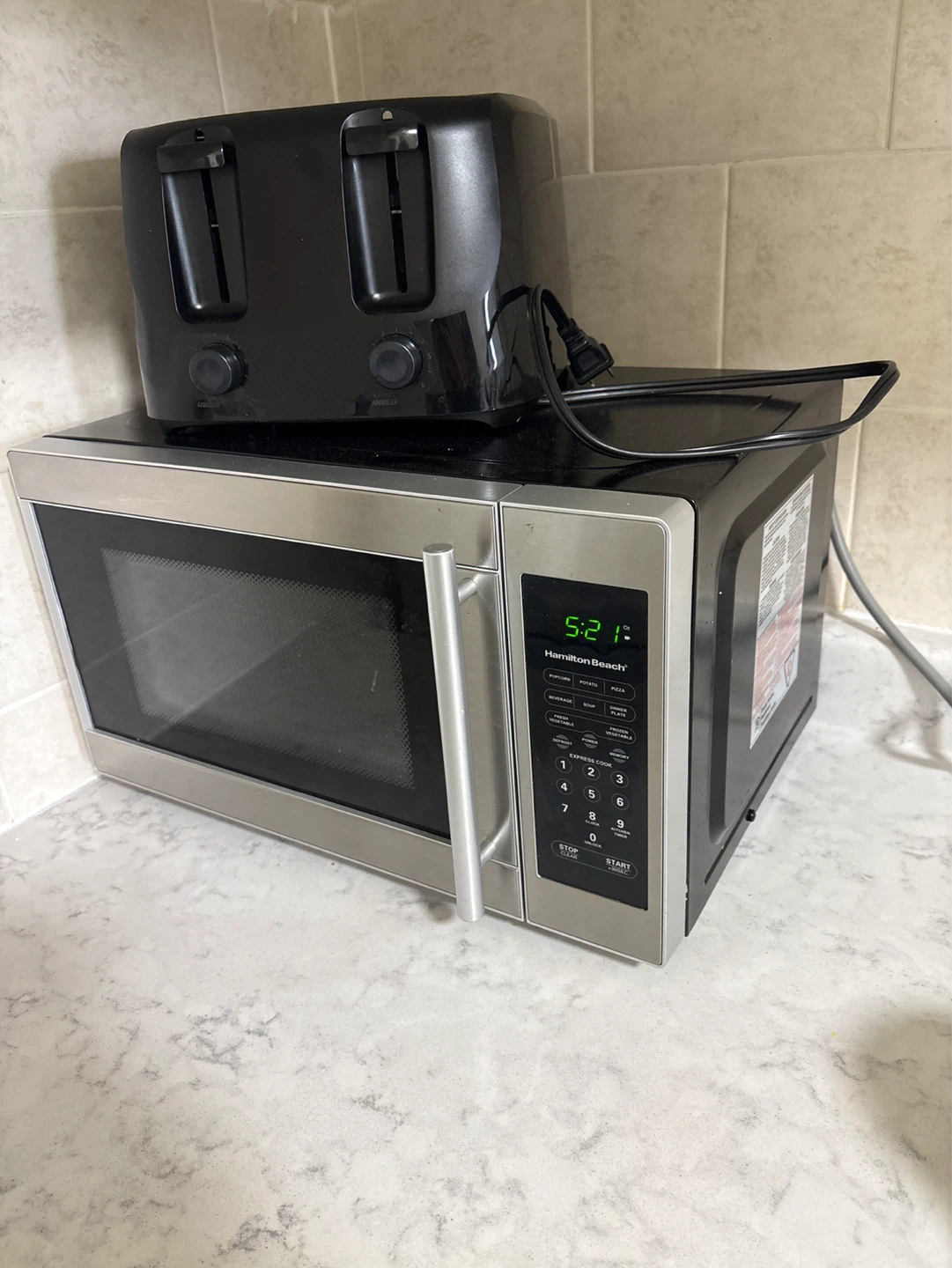 Hamilton Beach Microwave and Black Toaster
