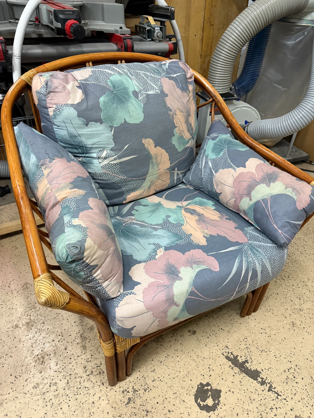 Vintage Rattan Sofa with Floral Cushions