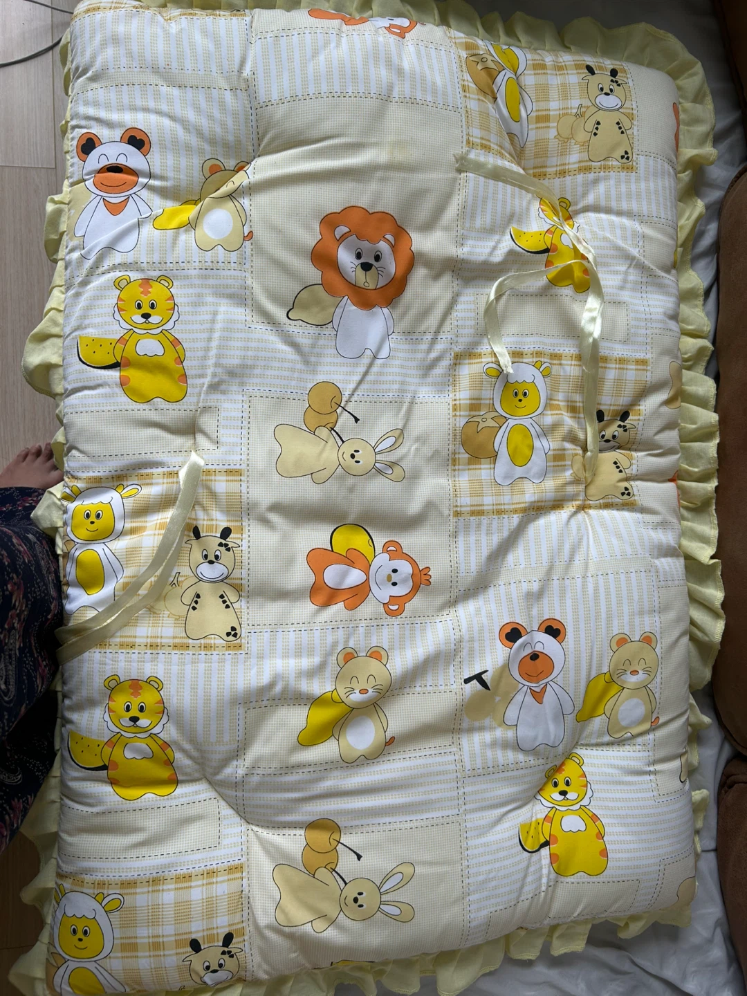 Yellow baby bedding with animal prints