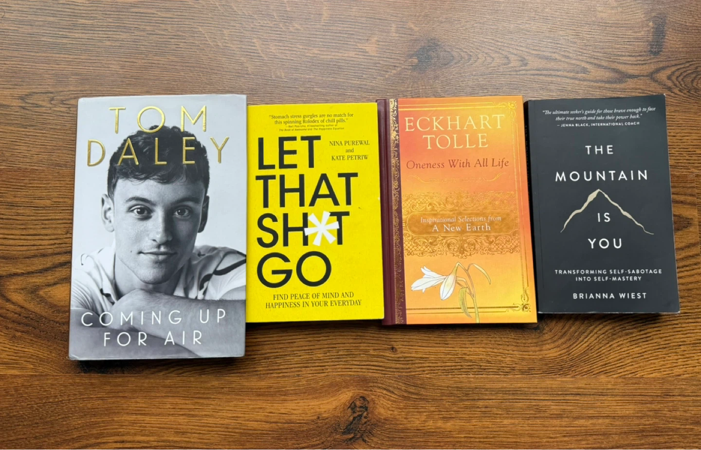 Bundle of 4 Books: Tom Daley, Eckhart Tolle, and more