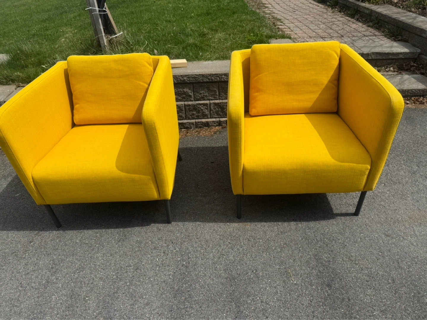 Ikea Two yellow accent chairs
