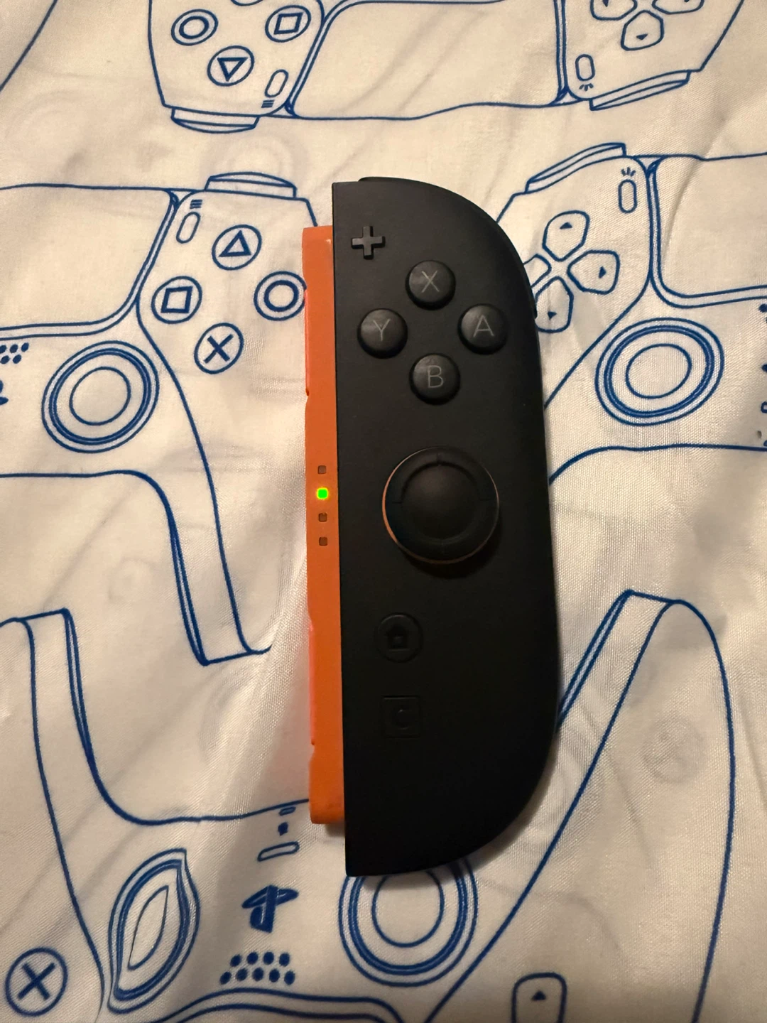 Nintendo Switch Joy-Con (R) Controller - Orange/Black