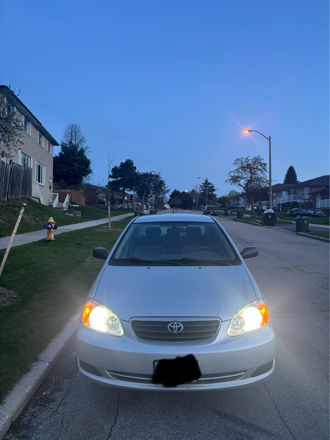 2005 Silver Toyota Corolla Sedan with safety