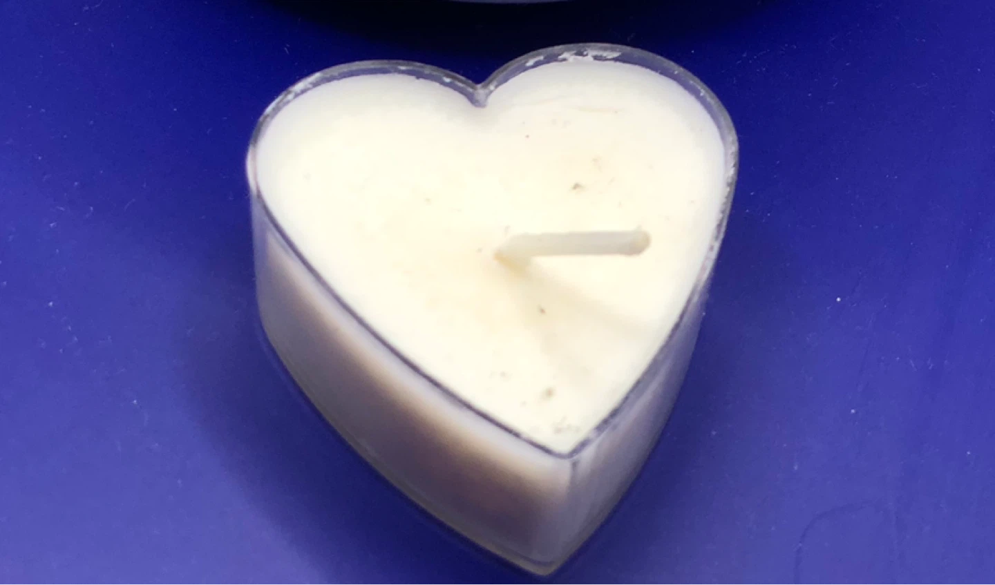 Heart-shaped tea light candle