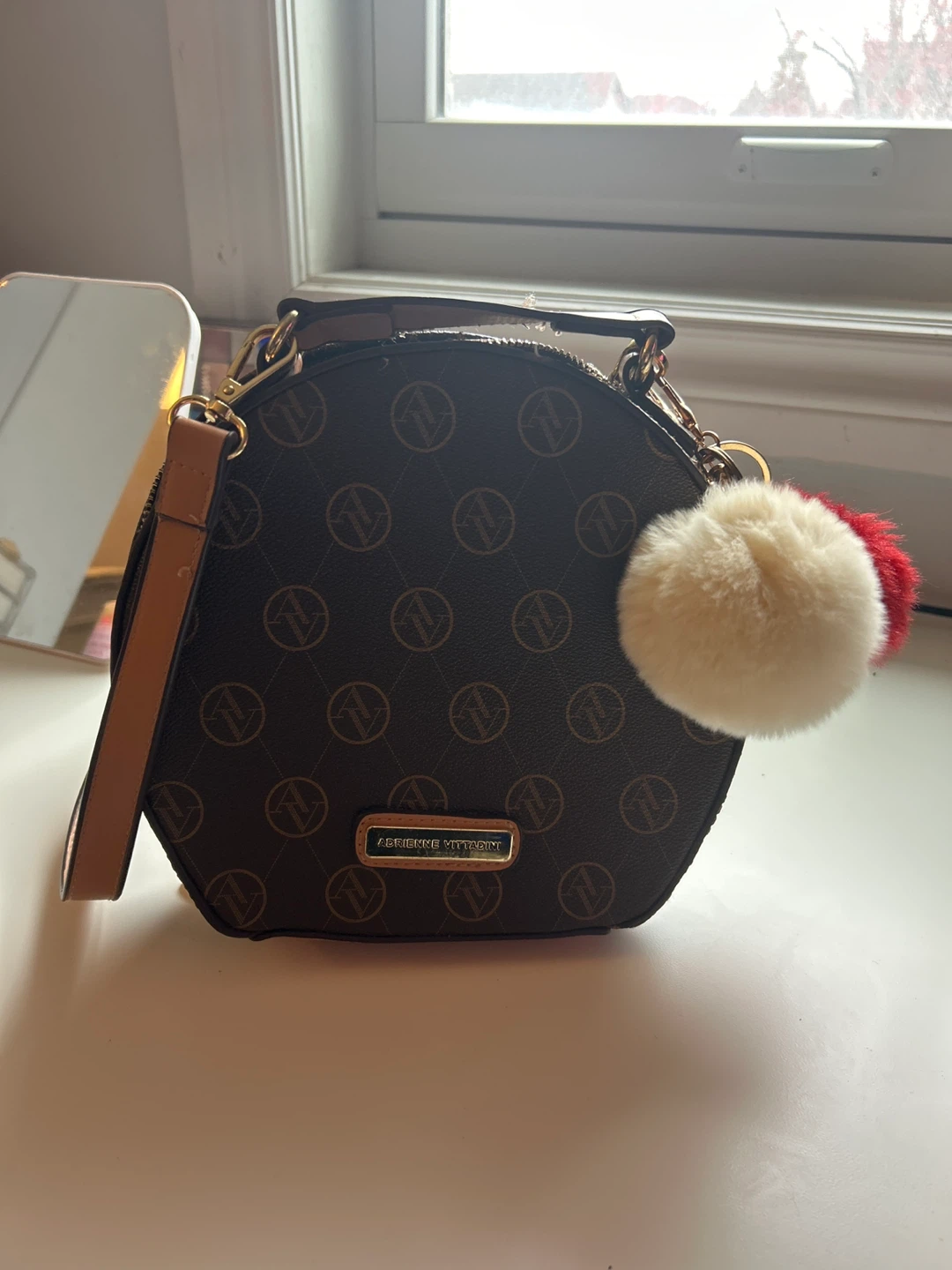 Adrienne Vittadini Round Crossbody Bag with Pom Pom Charms