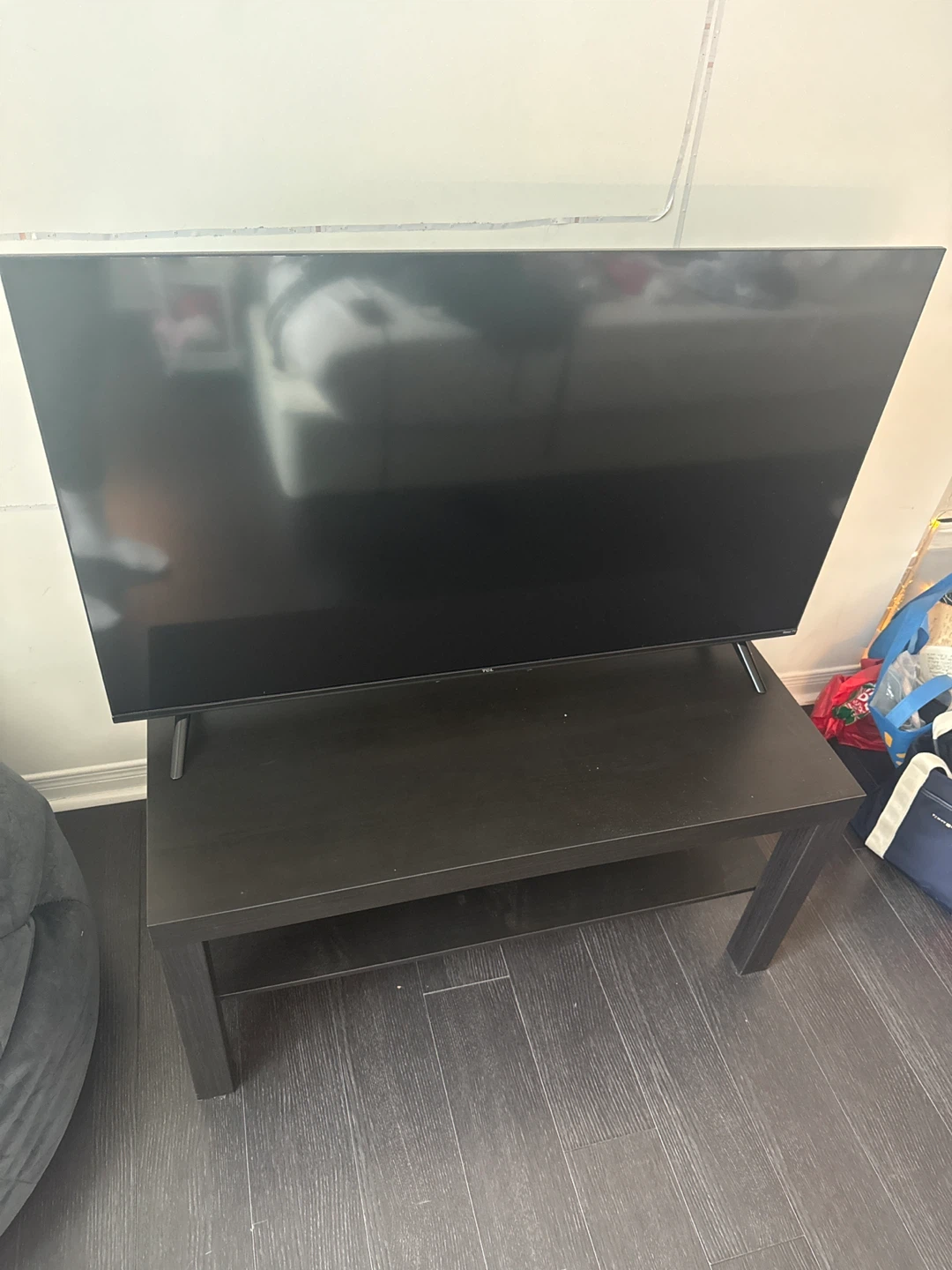 Roku TV   and  Dark Wood TV stand
