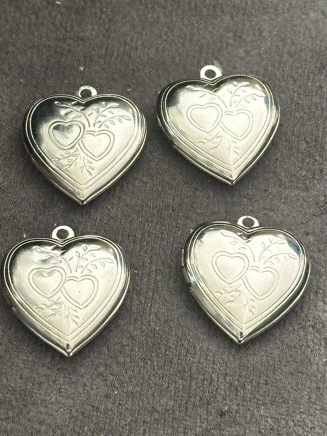 4 matching heart shaped lockets