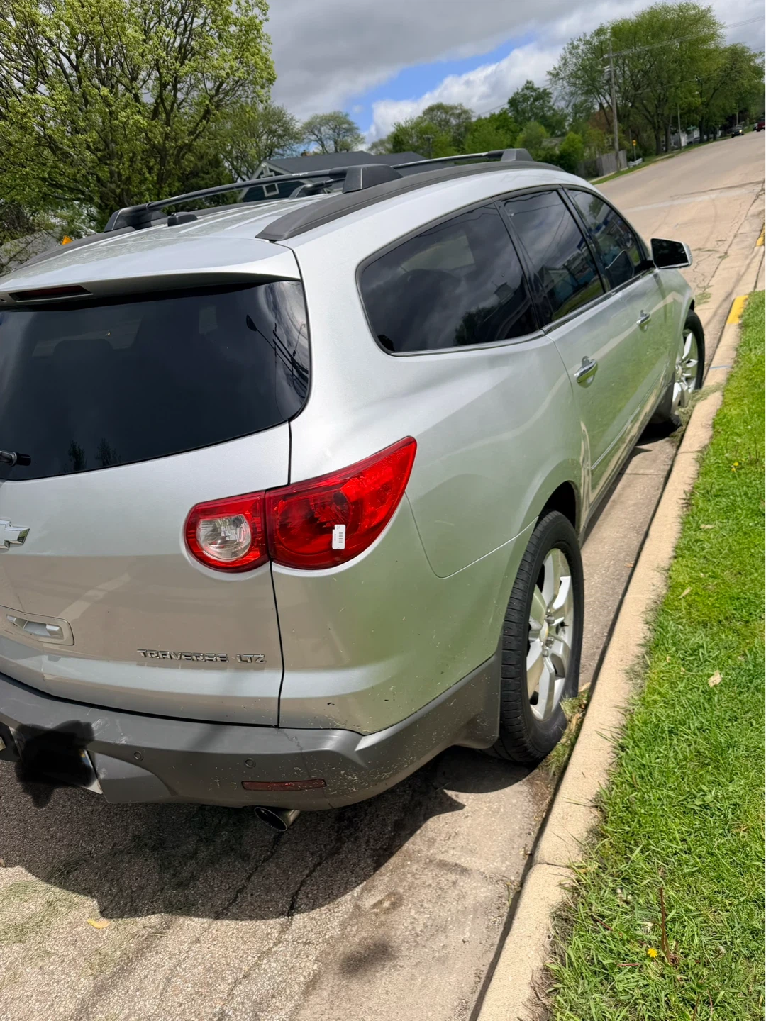 Silver Chevrolet Traverse SUV - photo 2