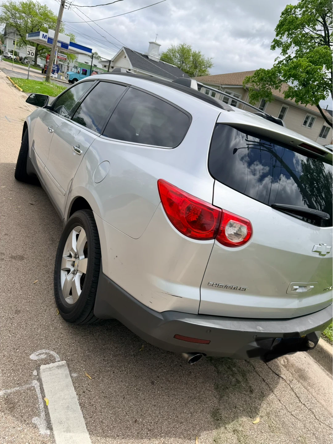 Silver Chevrolet Traverse SUV - photo 3