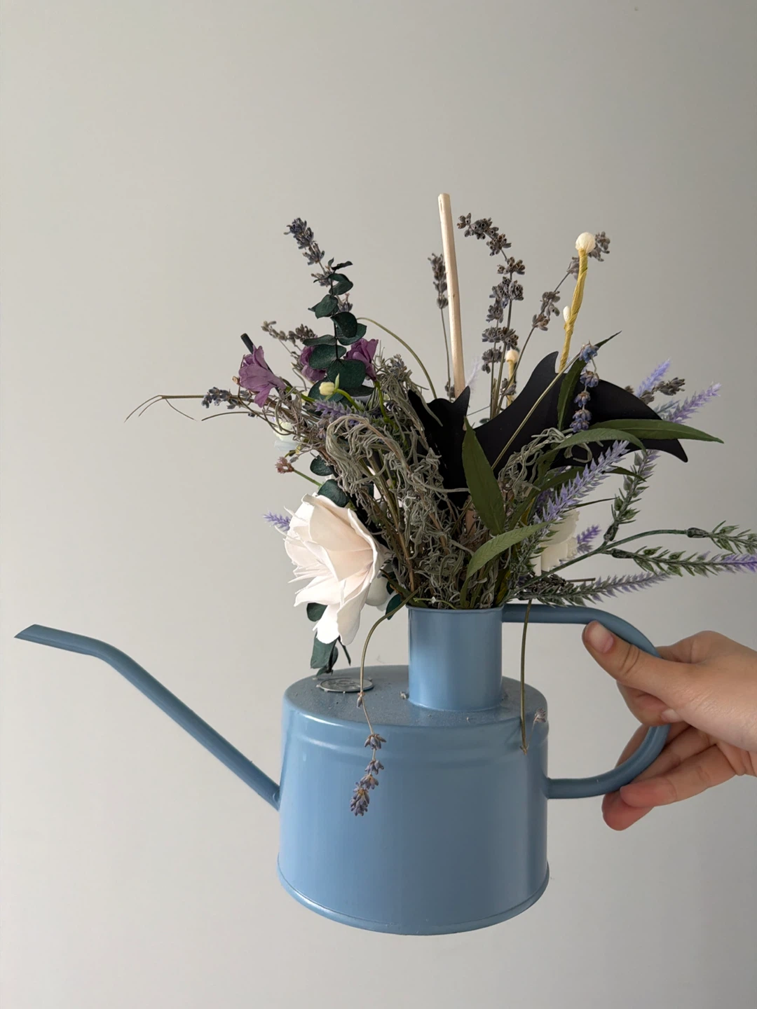 Blue Watering Can with Artificial Flowers and Lavender