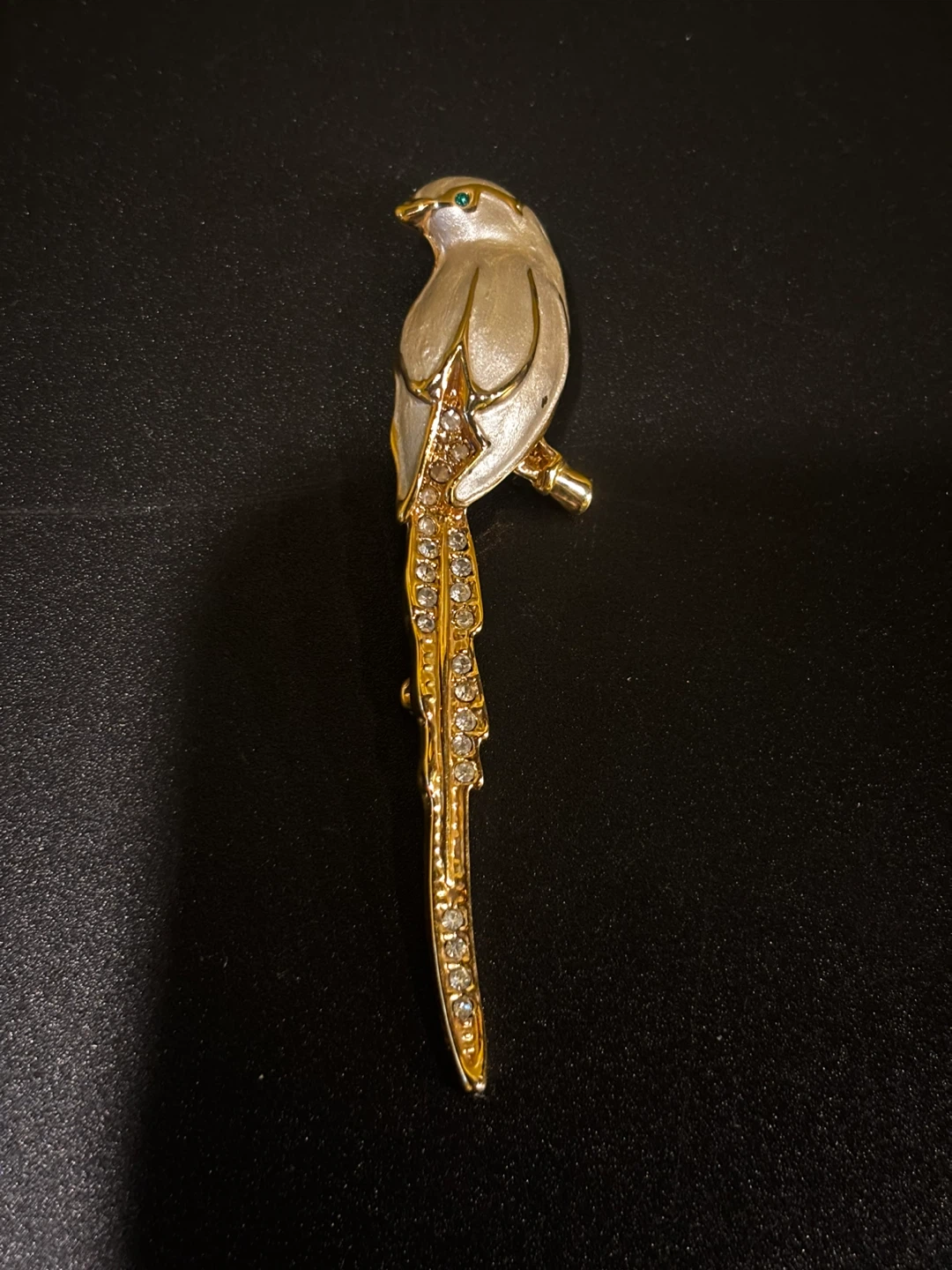 Gold-tone bird brooch with rhinestones