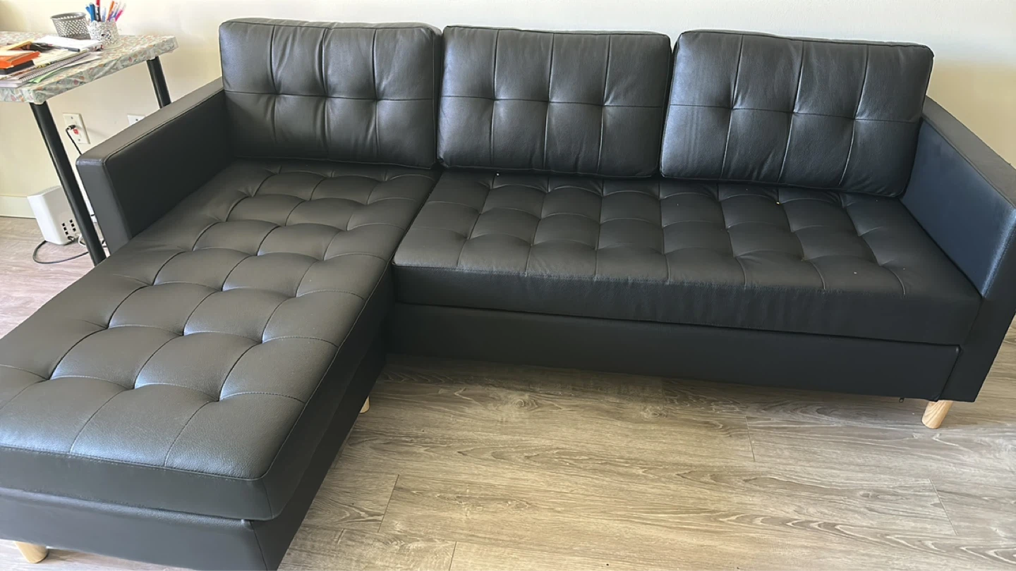 Black Faux Leather Sectional Sofa with Tufted Cushions