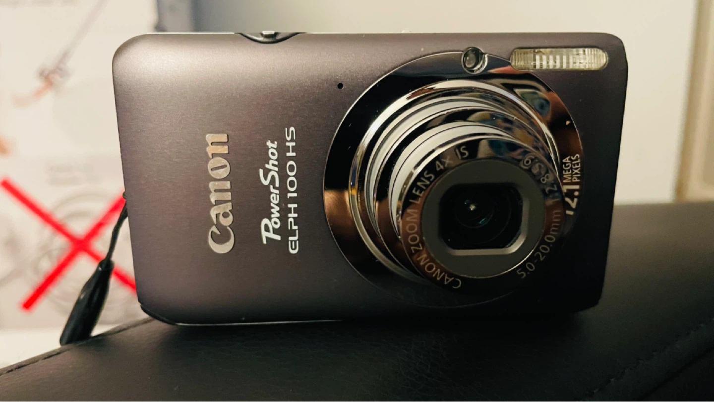 Canon PowerShot ELPH 100 HS Digital Camera with Accessories