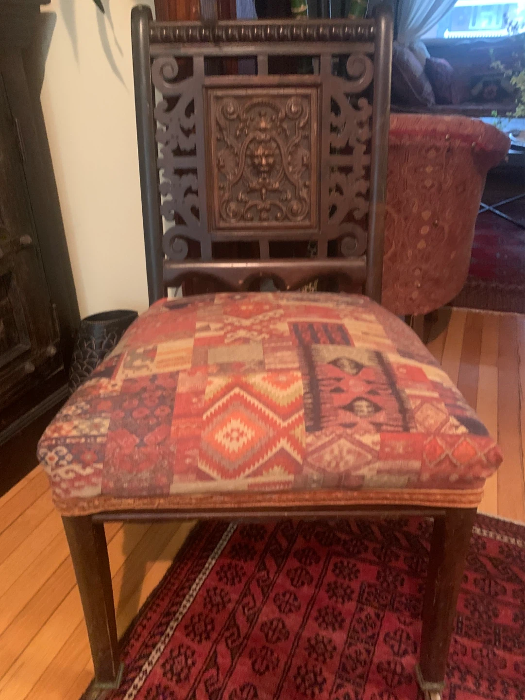 Antique Carved Wood Accent Chair with Ornate Upholstery