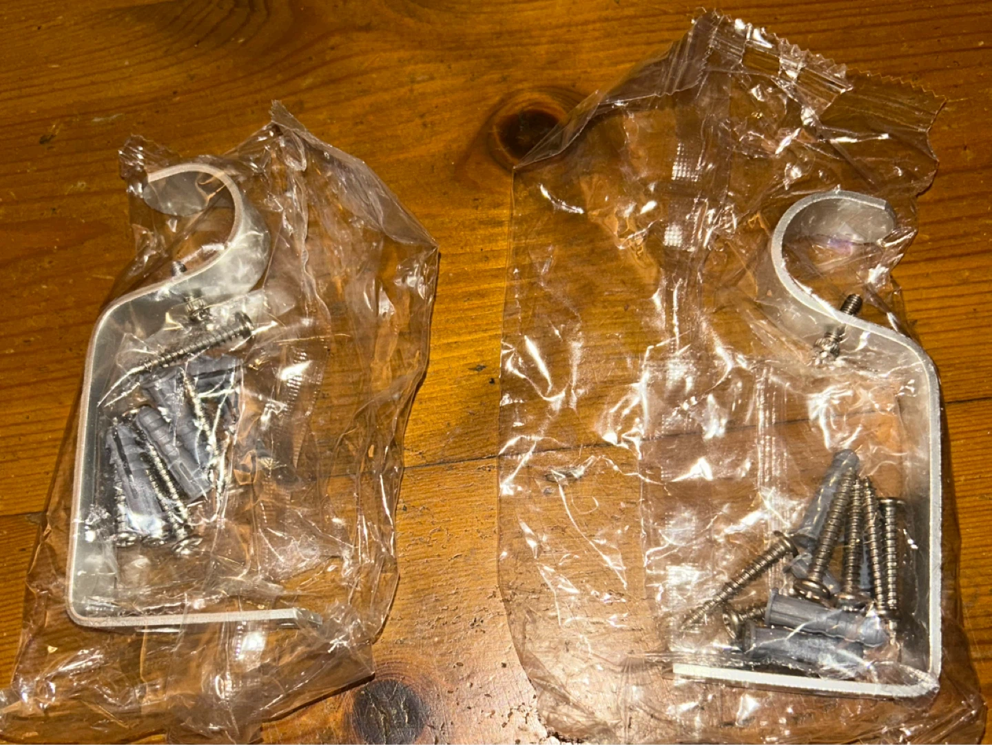 Two Curtain Rod Brackets with Screws and Anchors