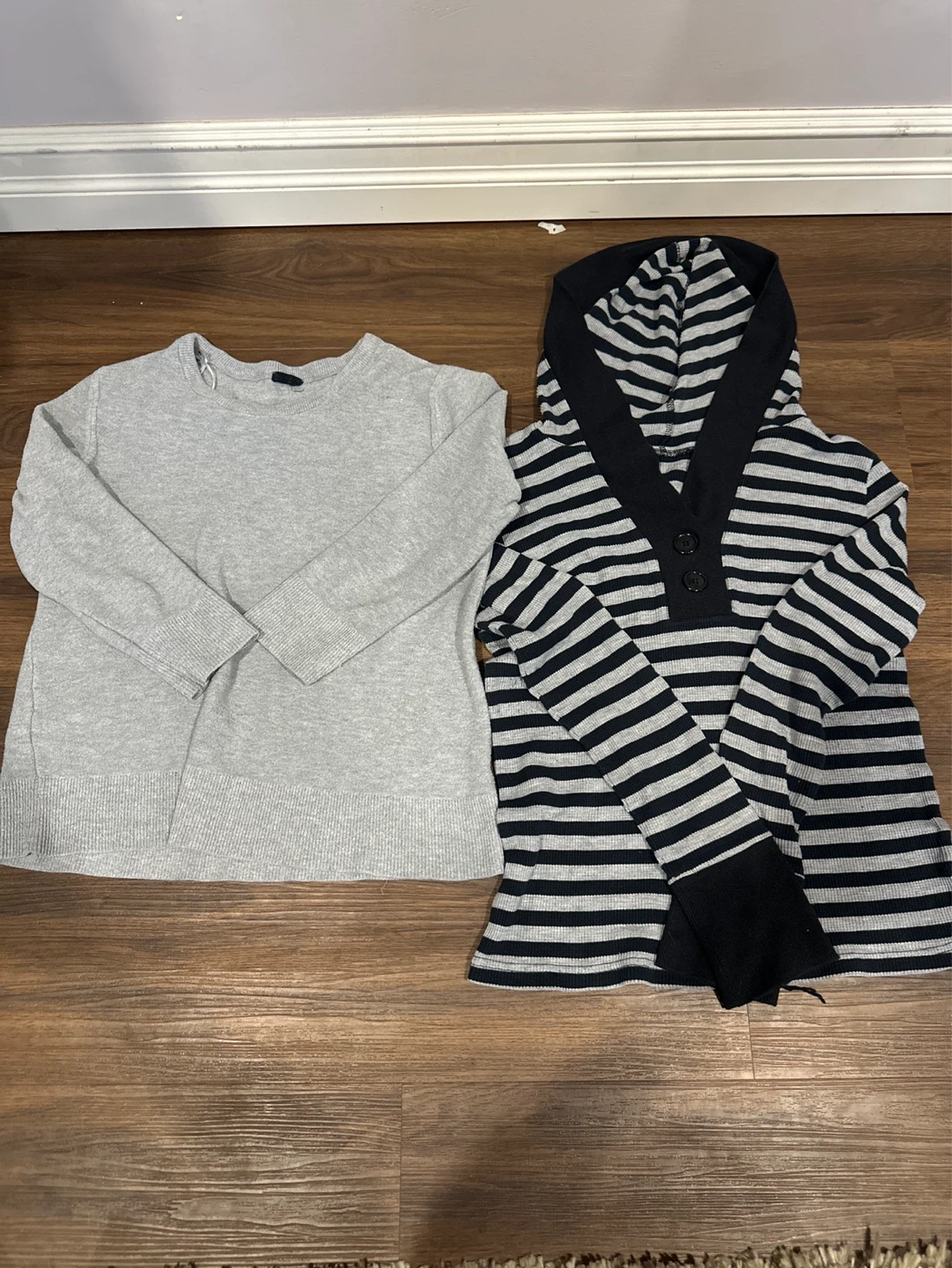 Bundle of two sweaters: grey crewneck and striped hooded top