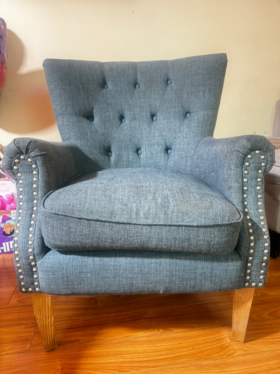 Blue Upholstered Armchair with Studded Details