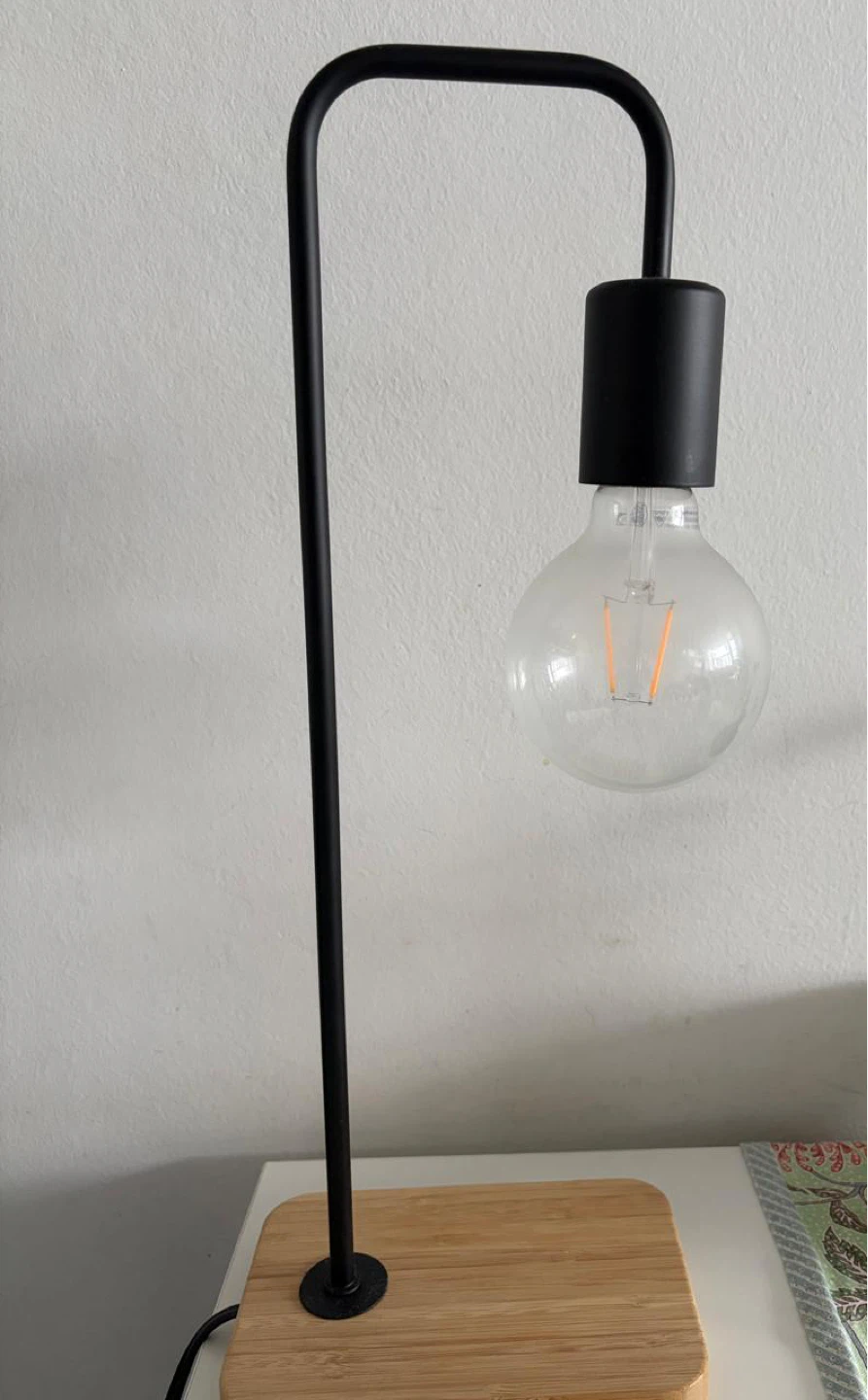 TVÄRHAND Table lamp, black/bamboo (includes bulb)