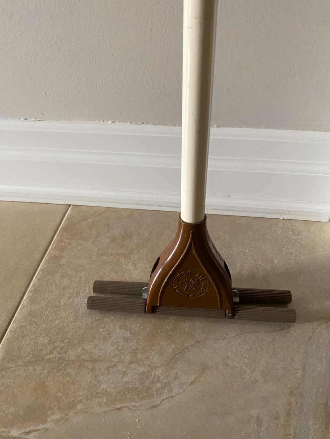 Brown and White Mop