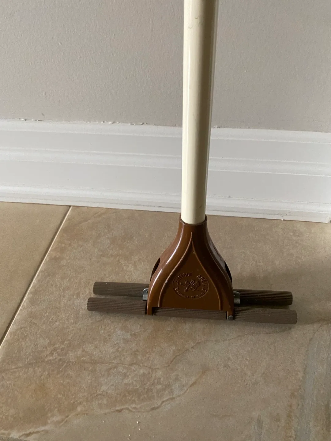 Brown and White Mop
