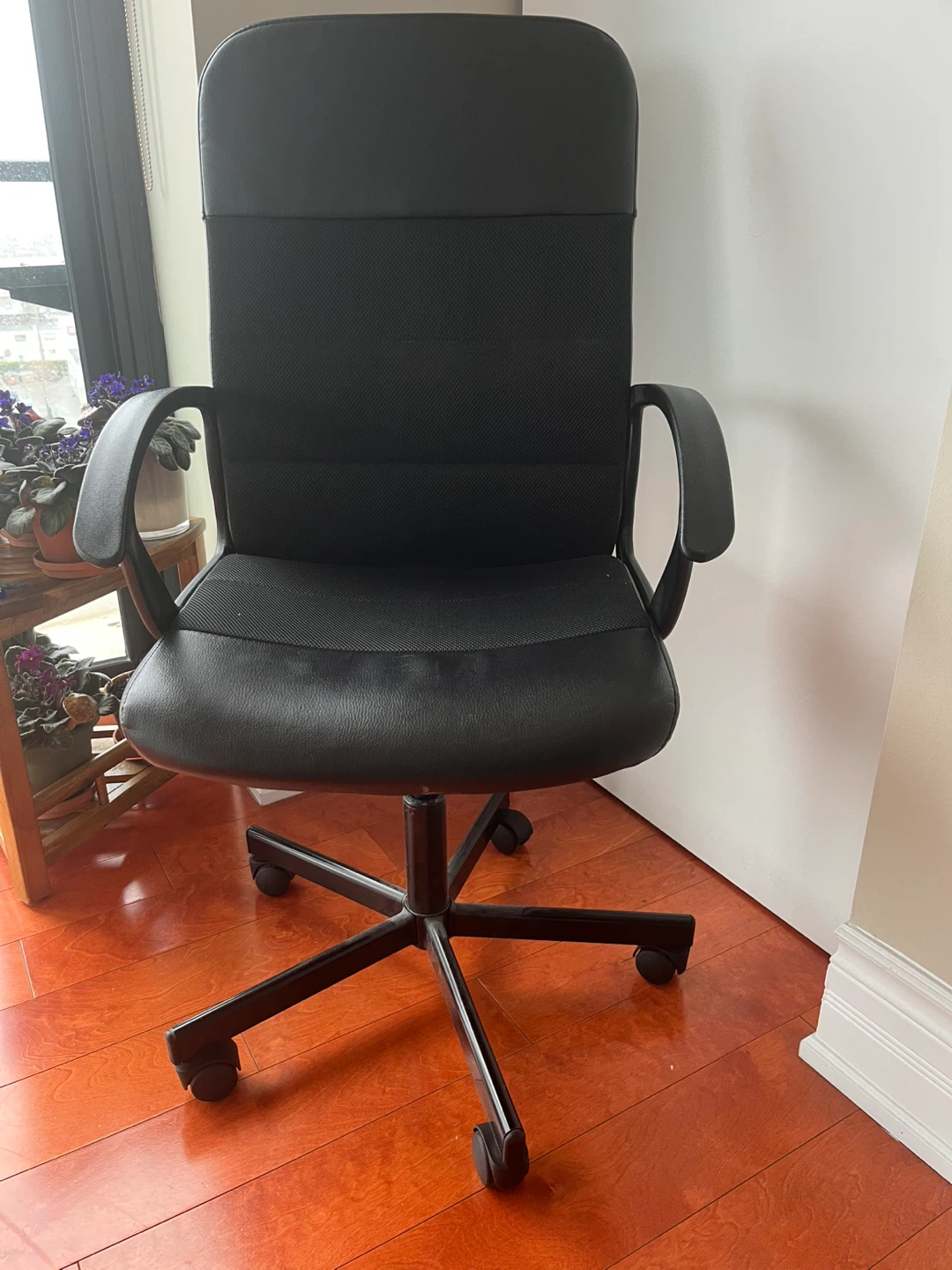 Black office chair with armrests