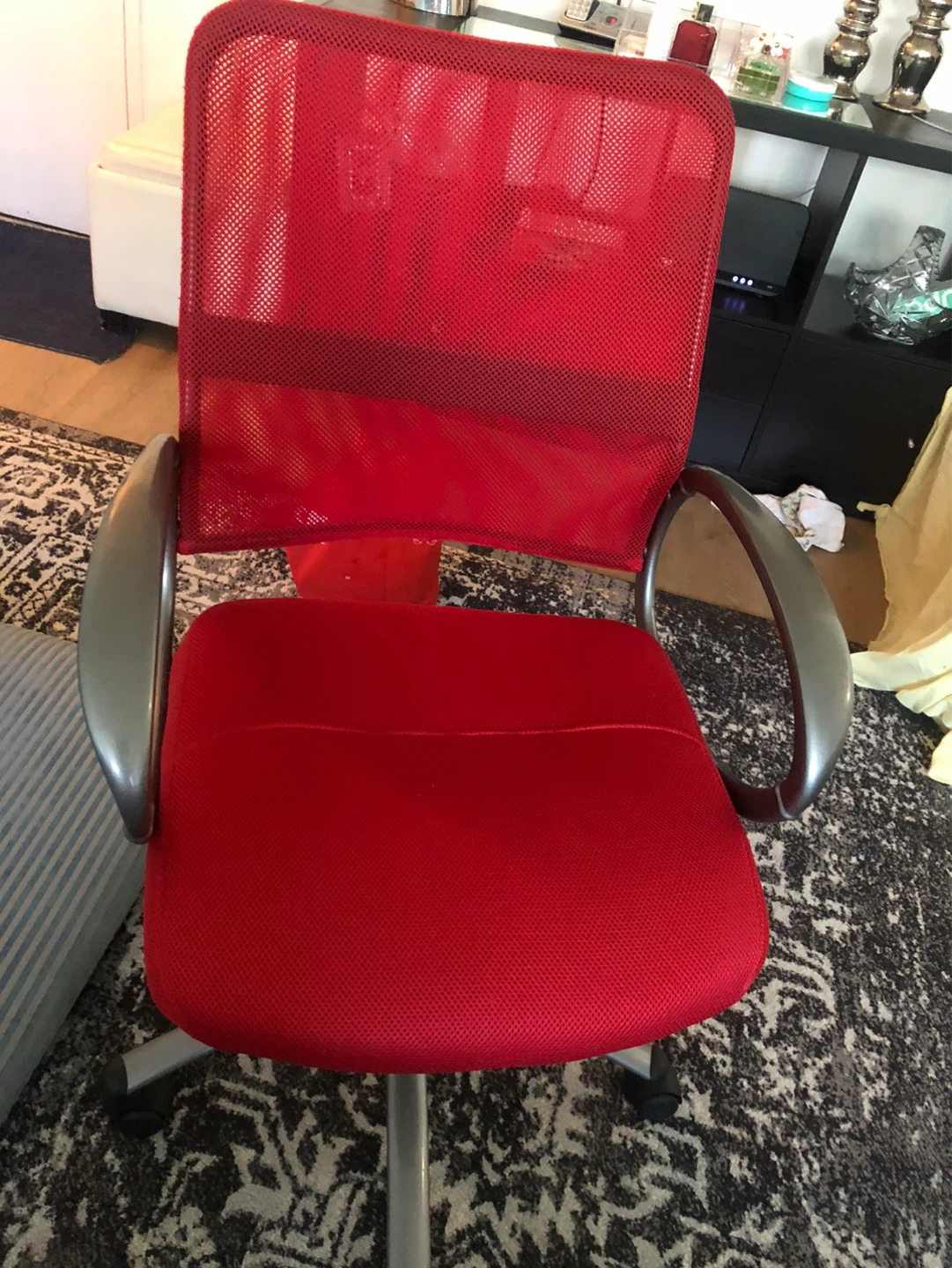 Red office chair with mesh back