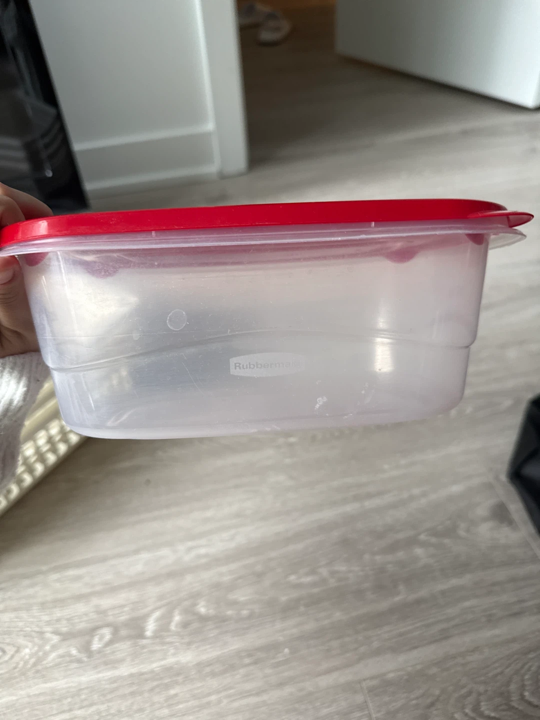 Rubbermaid food storage container with red lid