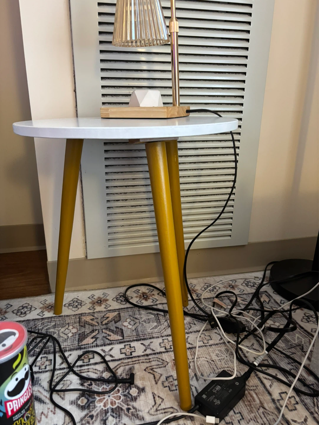 White Round End Table with brownish Legs