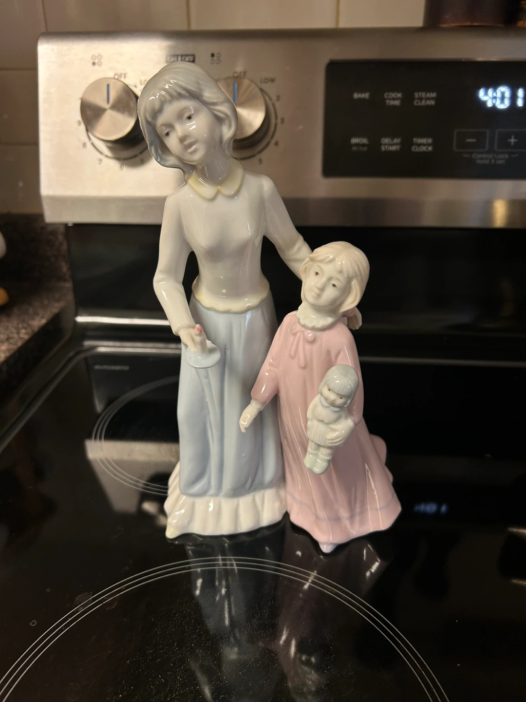 Porcelain Figurine of Mother and Child