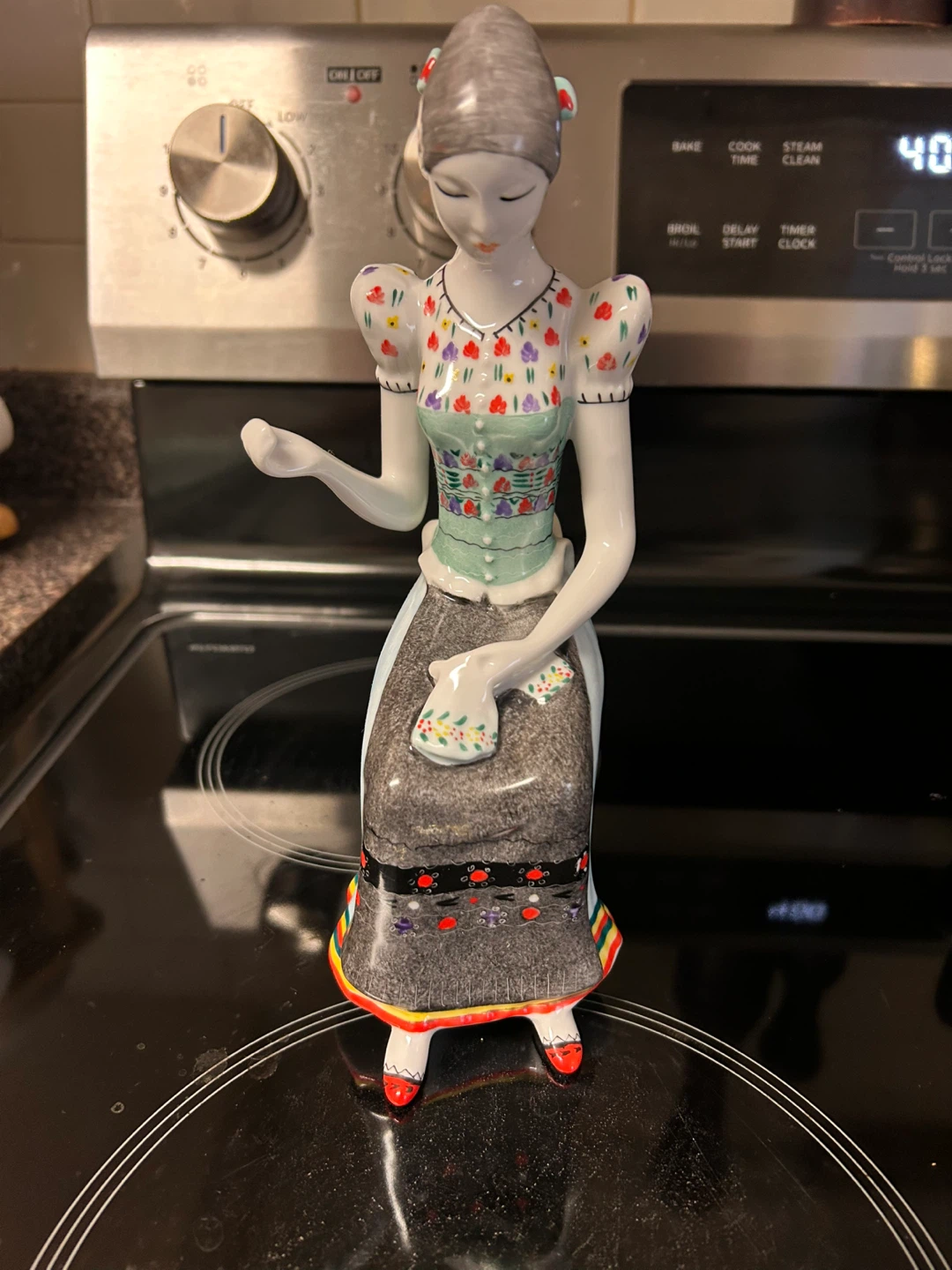 Ceramic Figurine of Woman in Traditional Dress