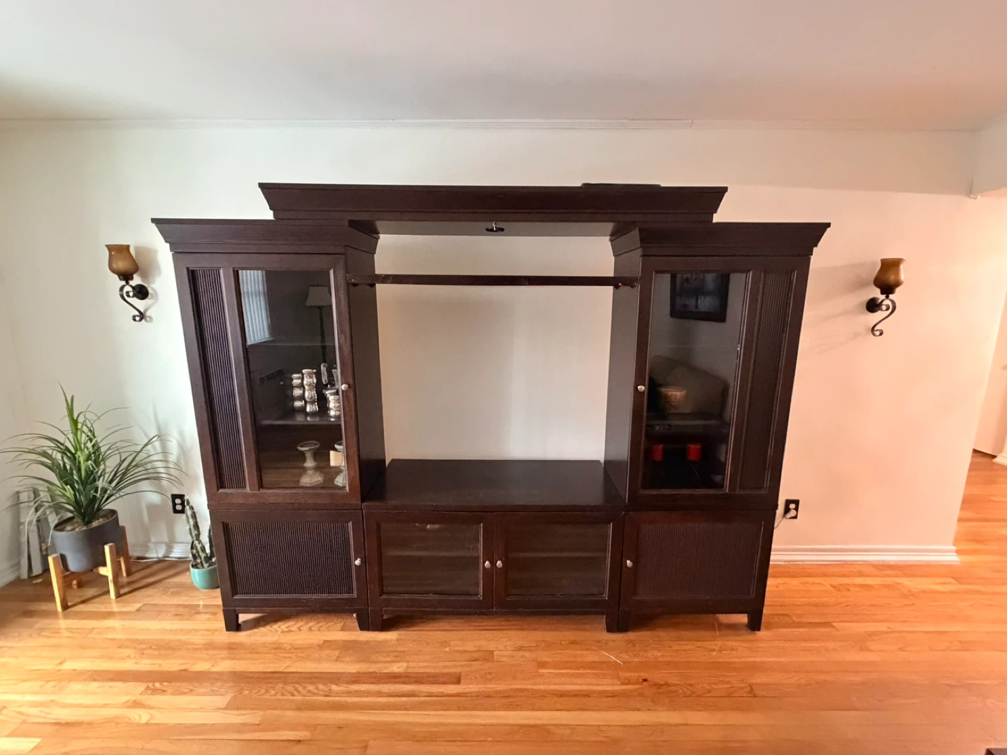 Dark Wood Entertainment Center with Glass Cabinets