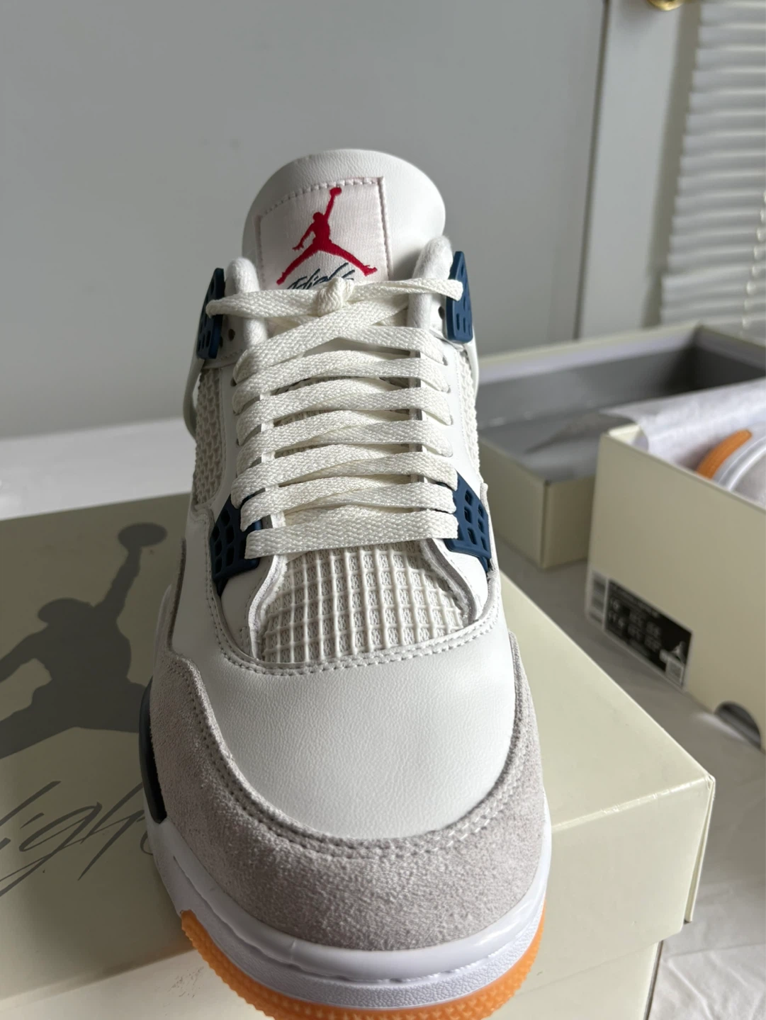 Air Jordan 4 Retro SB 'White Navy' Sneakers - photo 4