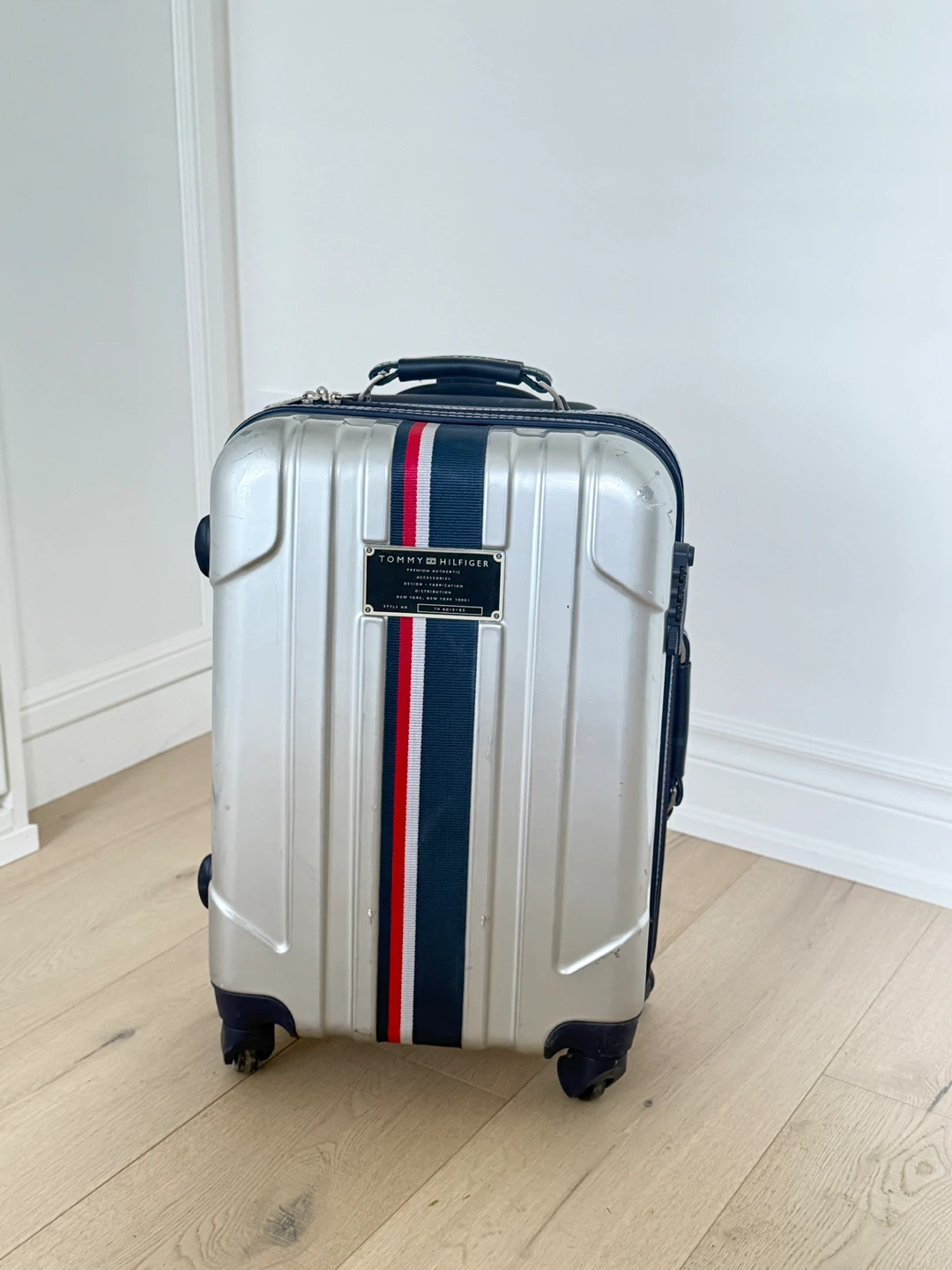 Tommy Hilfiger 21” carry-on luggage
