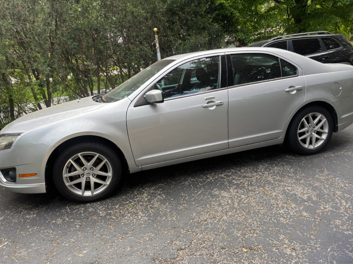 Silver Ford Fusion SEL Sedan