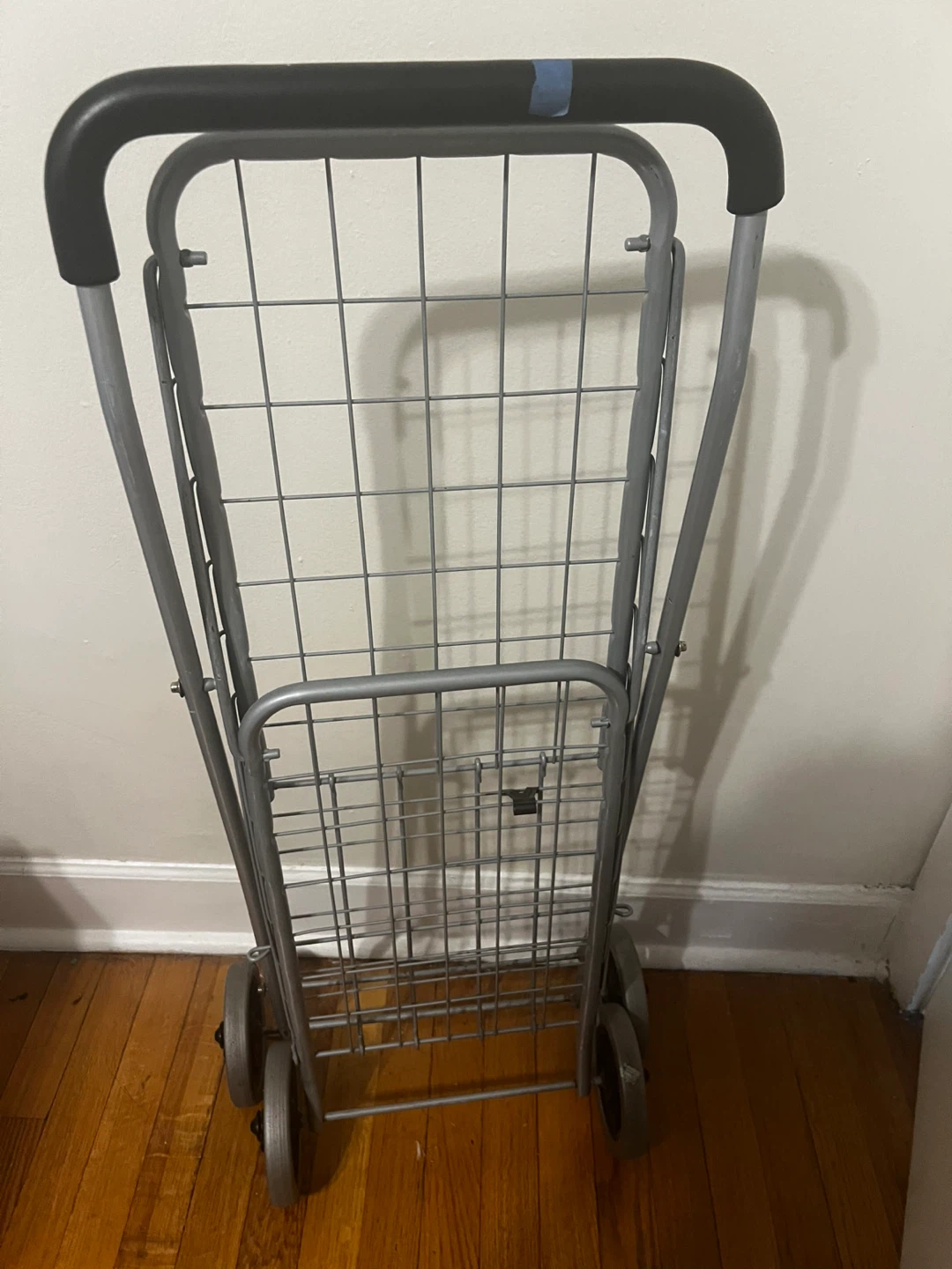 Gray Metal Rolling Shopping Cart