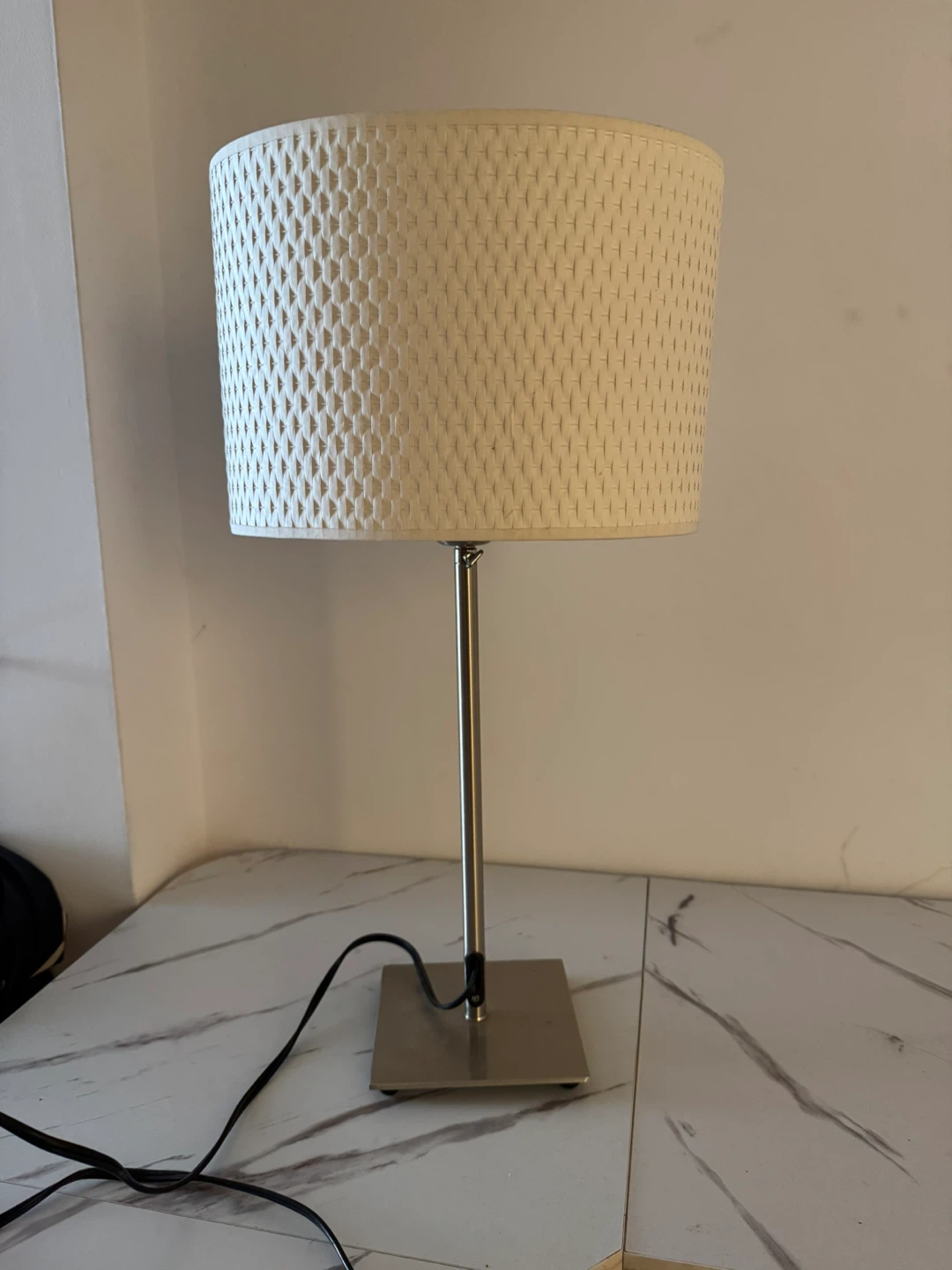 White textured drum shade table lamp