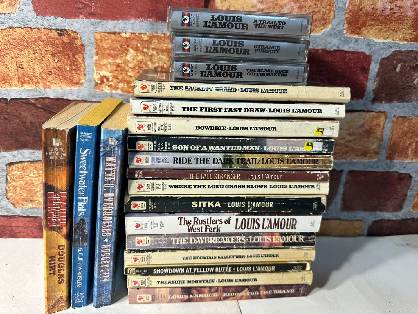Collection of Louis L'Amour Western Books and Audio Cassettes