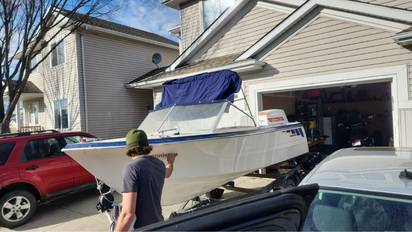 15’ Fiberglass Boat with Fisher-Pierce Bearcat 55 Outboard Motor