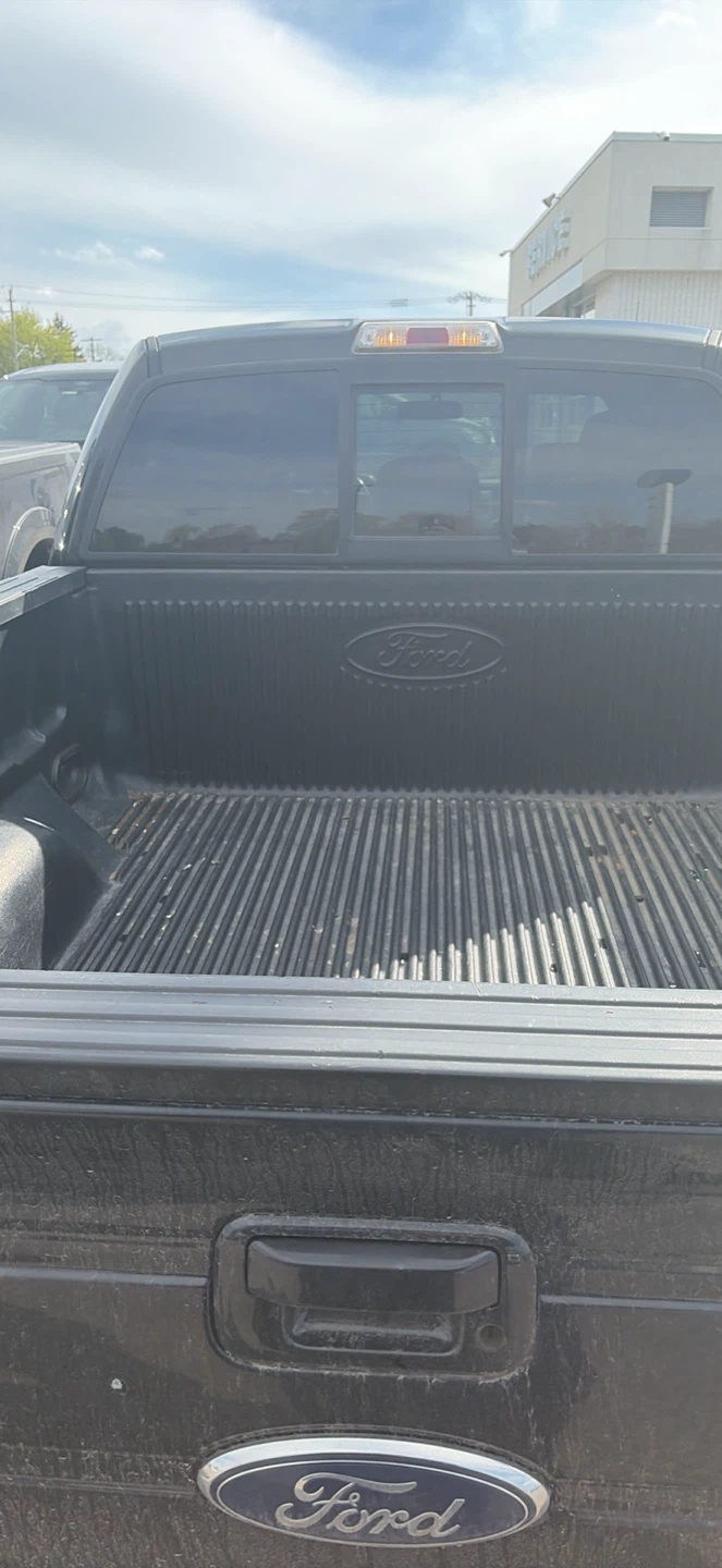 Black Ford F-150 Crew Cab 4x4 Pickup Truck