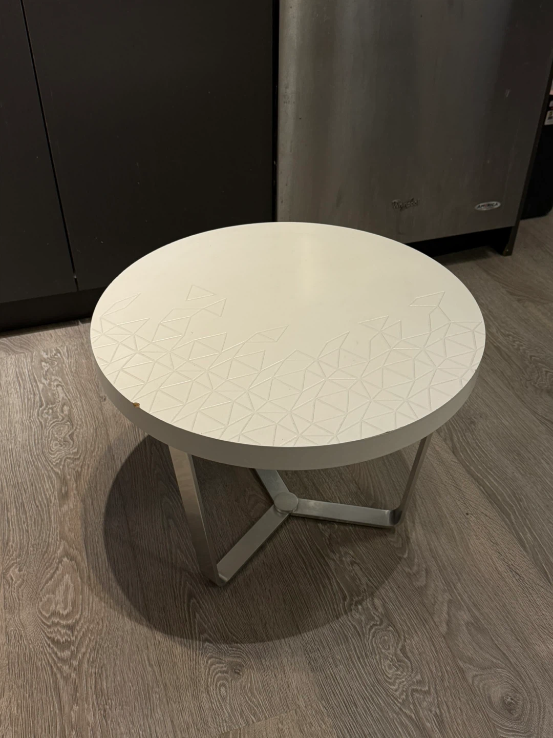 White Round Coffee Table with Geometric Pattern