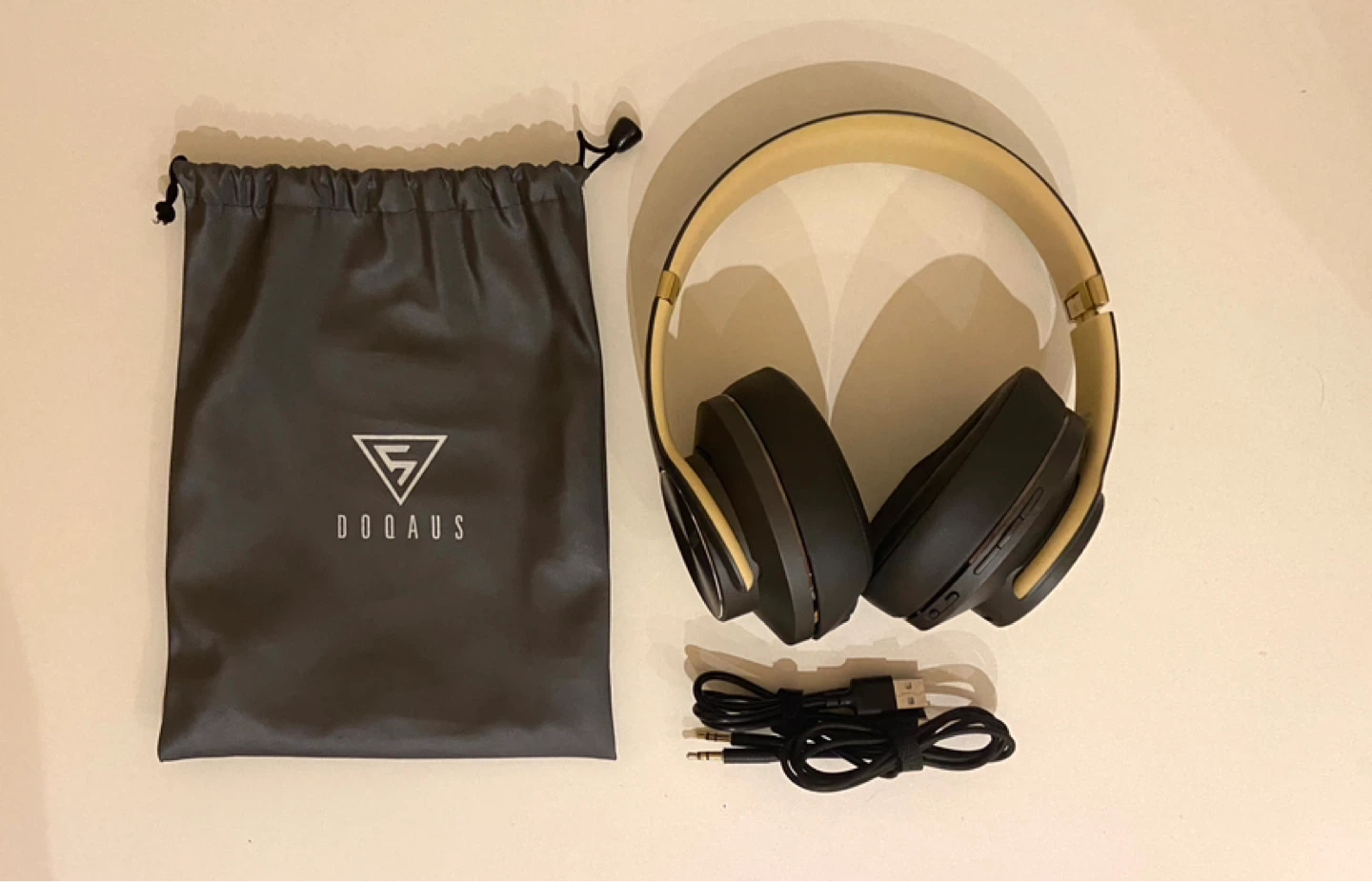 DOQAUS Wireless Headphones with Pouch and Cables