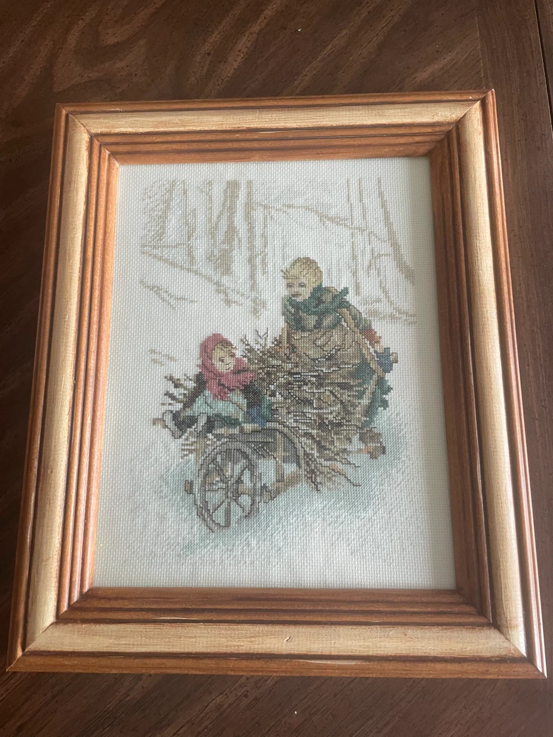 Framed Cross-Stitch Art: Two Children and a Dog in Snow