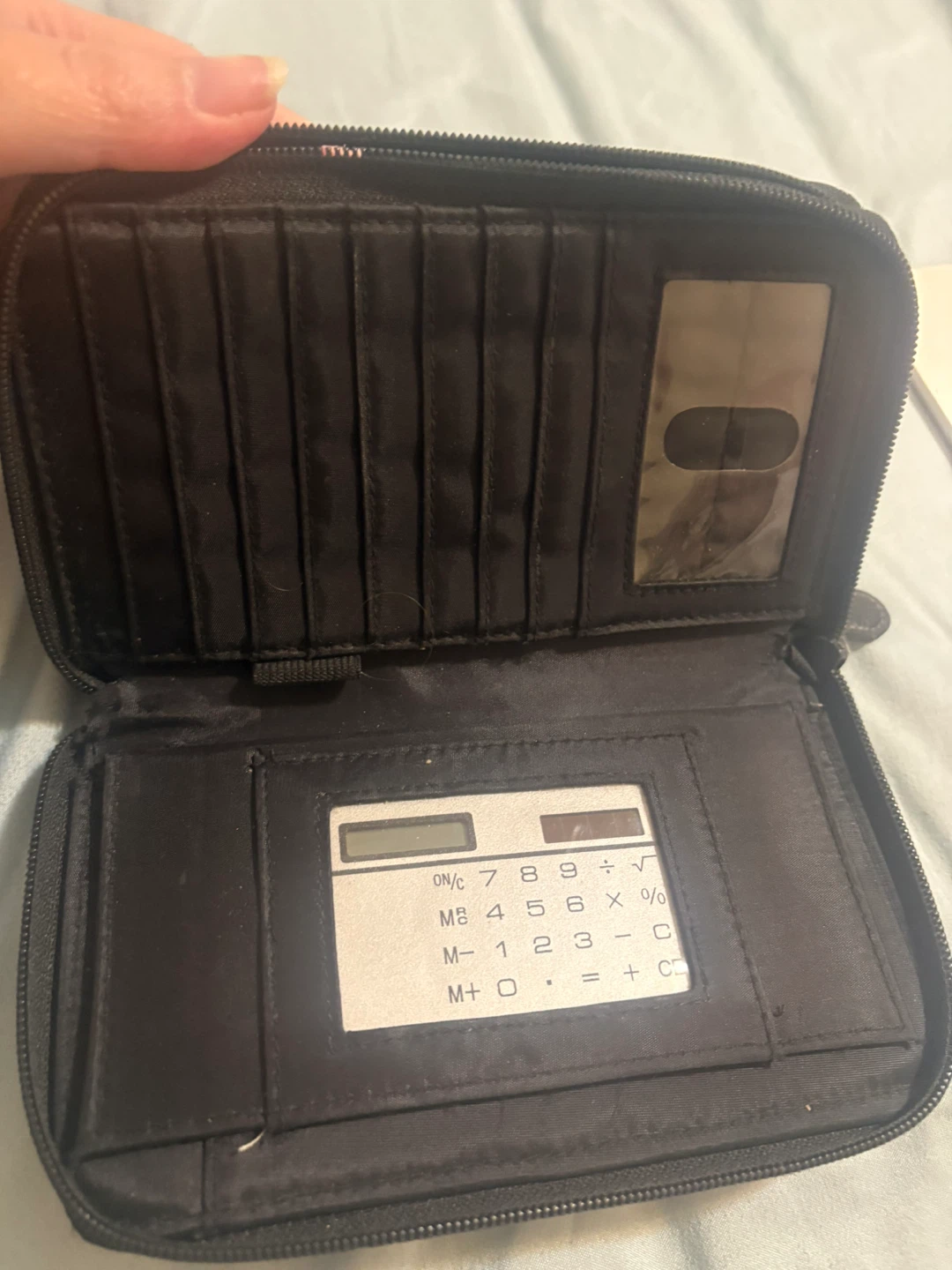 Black zip-around wallet with built-in calculator - photo 2