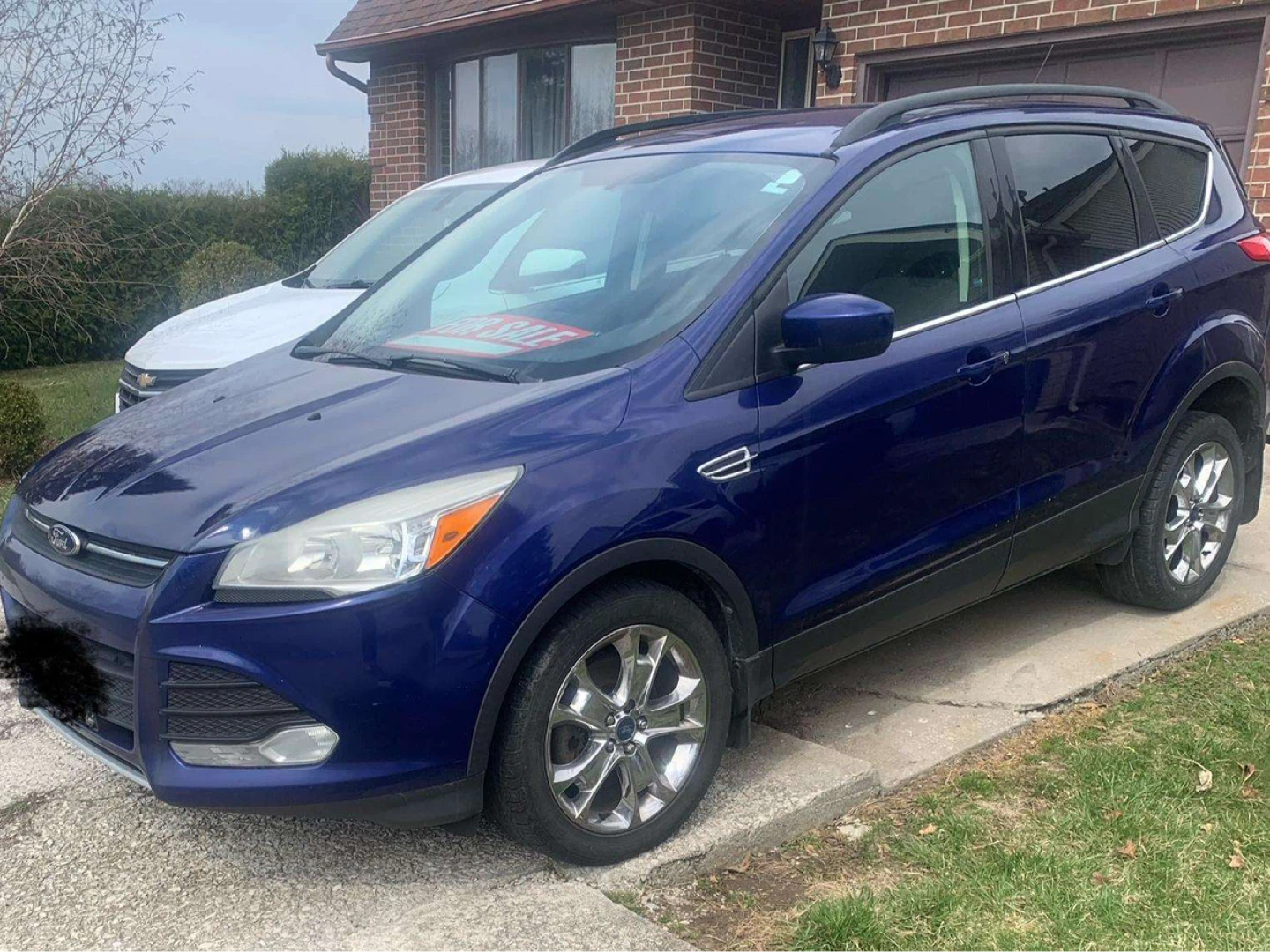 Blue Ford Escape SUV