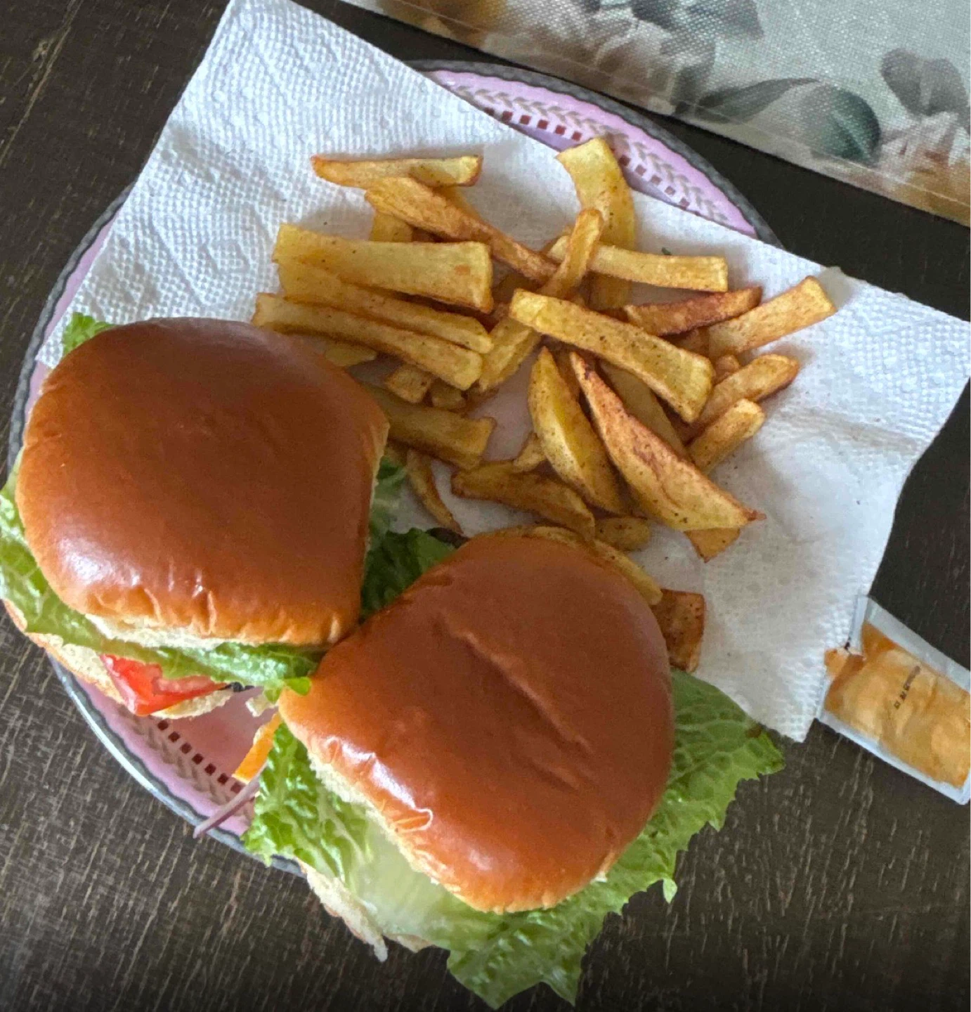 Two homemade burgers with fries