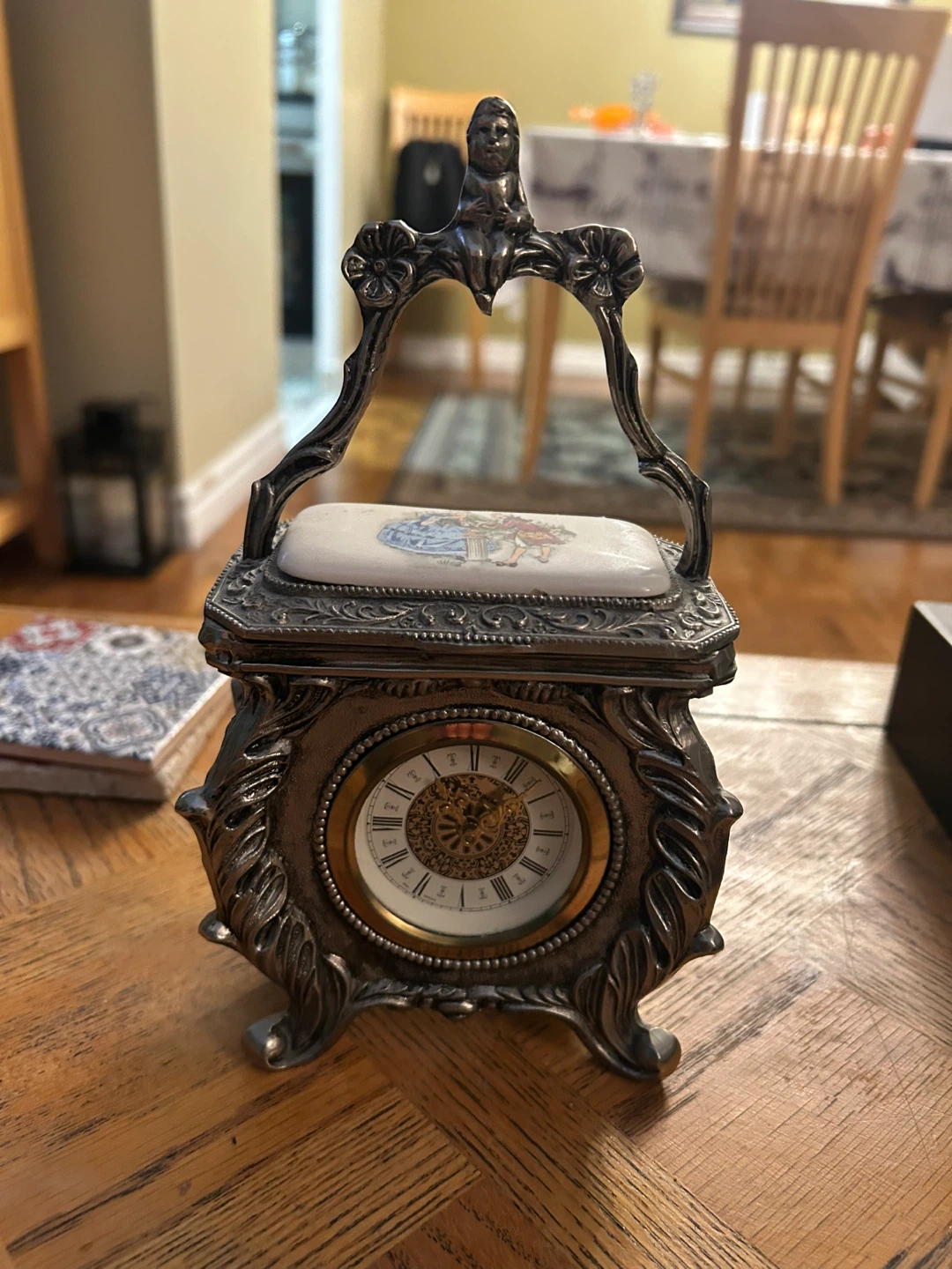Ornate Decorative Clock with Figurine Handle