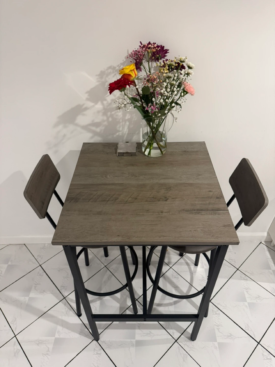 Bar height dining set with square table and 2 cushioned stools. - photo 3